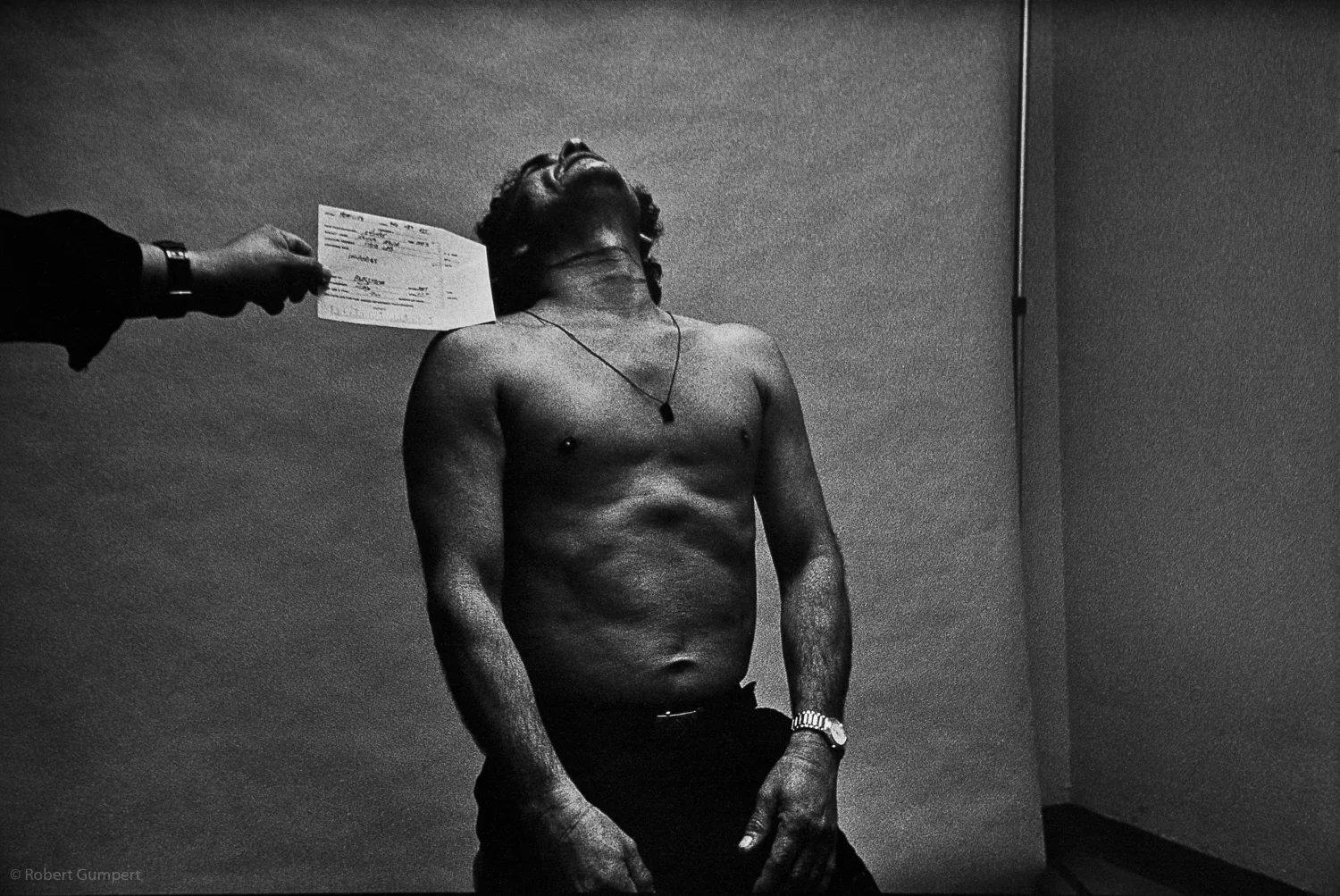 San Francisco, CA. Booking of murder suspect and documenting neck wounds from his attempt at suicide. Lost Promise - The Criminal Justice System. 1993-1996 in San Francisco, CA. In four parts: Cops in the Tenderloin area; Jail; Homicide; Tournment of Shadows: The Public Defender and the Courts.