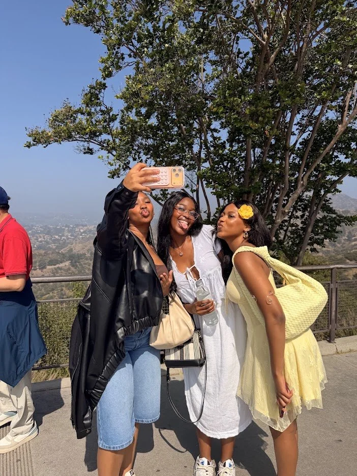 Friends taking a photo together in the Hollywood Hills