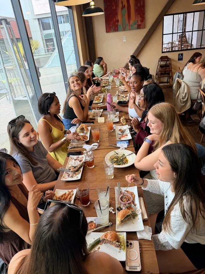 Los Angeles course group sharing a meal