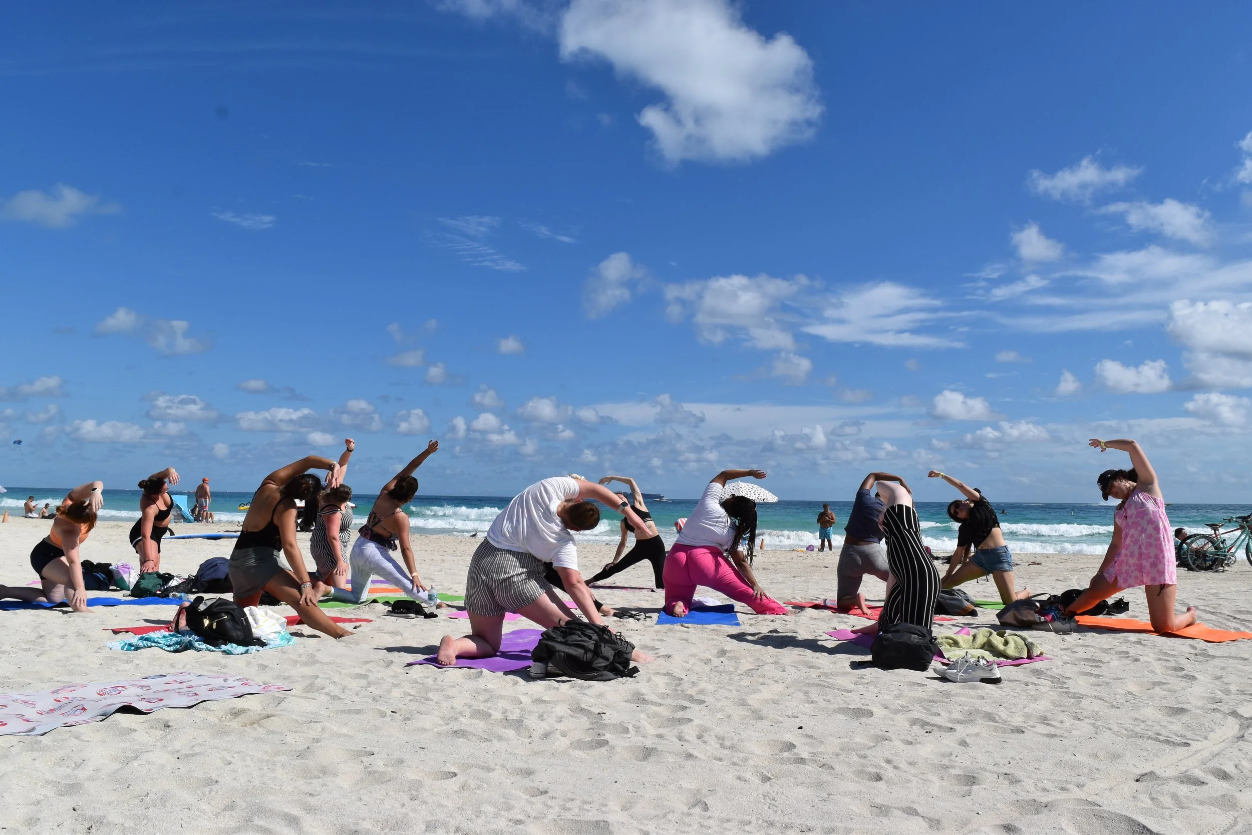 Students taking part in a wellness experience on Miami Beach