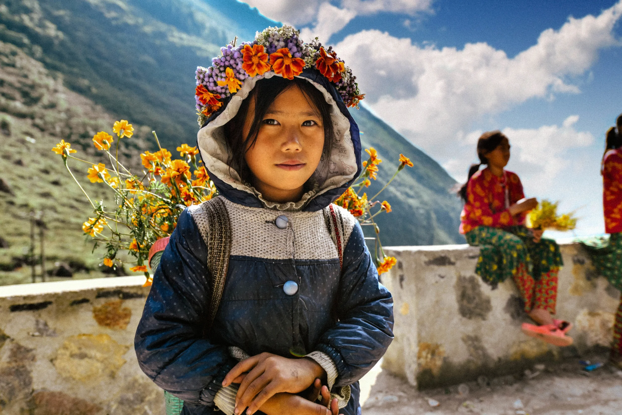 Hmong flower girl in traditional dress