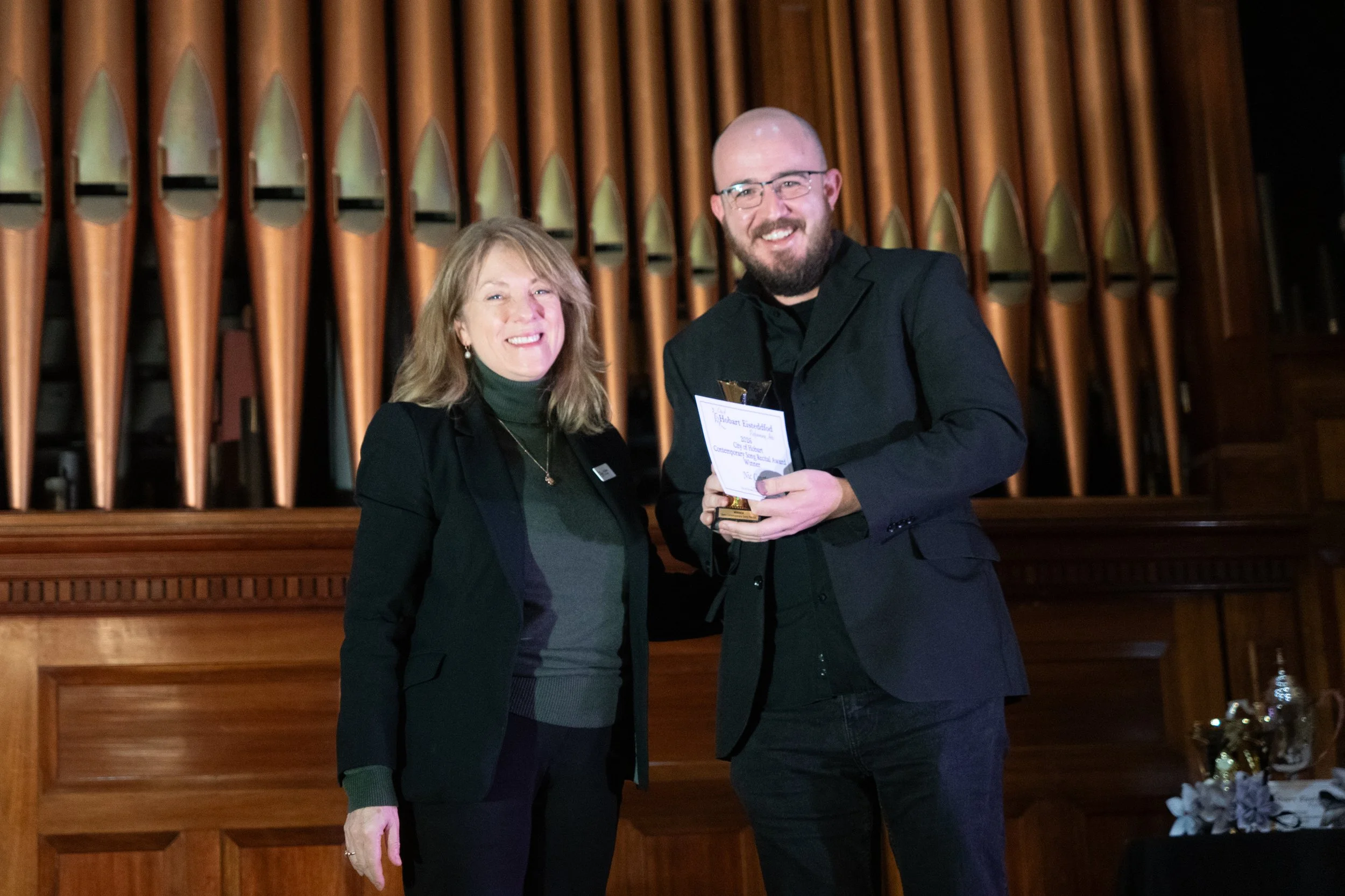 The City of Hobart Open Contemporary Song Recital Award winner, Nic Courto with Vice President, Leiz Moore.