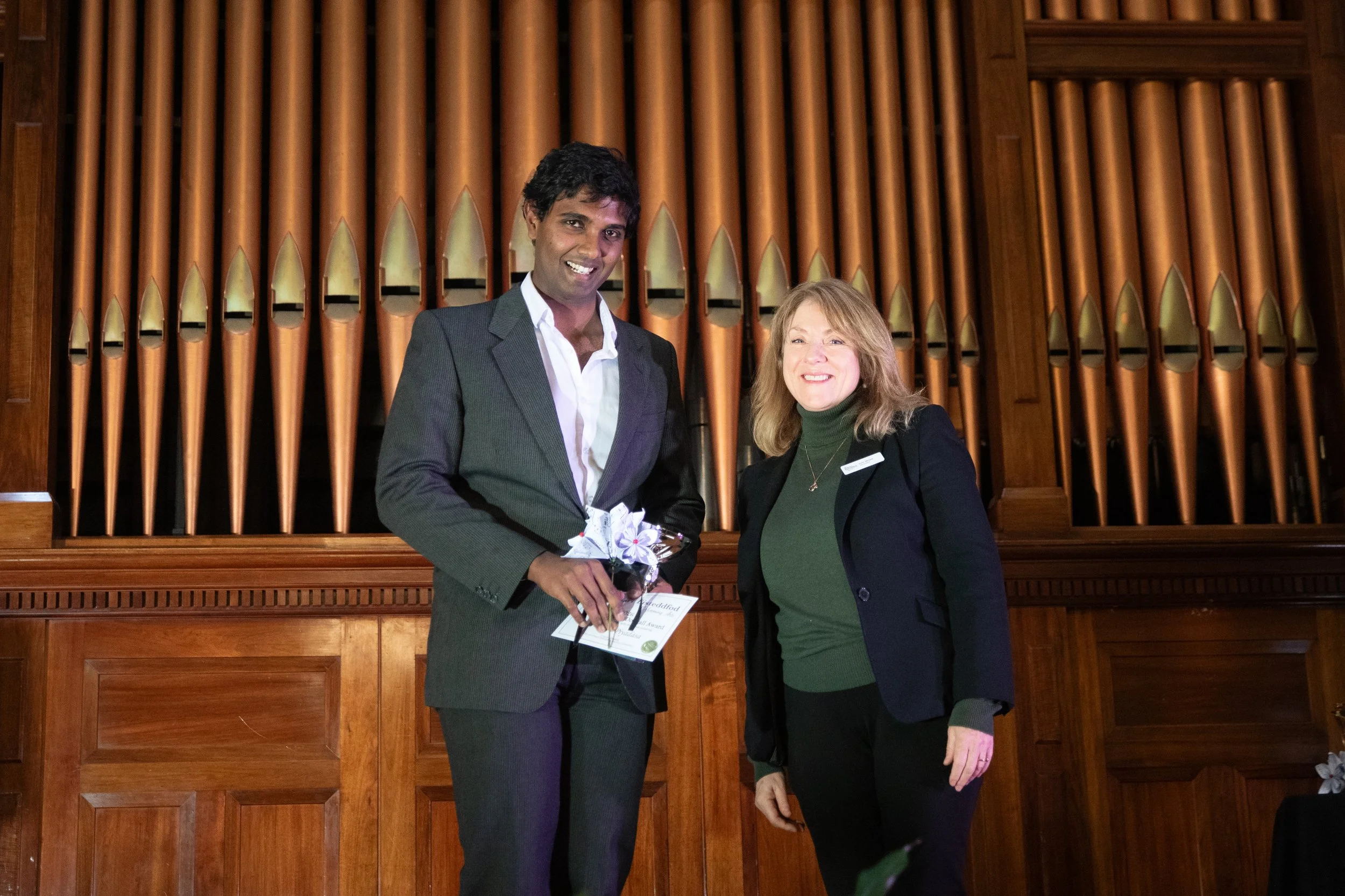 Enid Spencer McDougall Award winner, Praveen Piyadasa with Vice President, Leiz Moore.