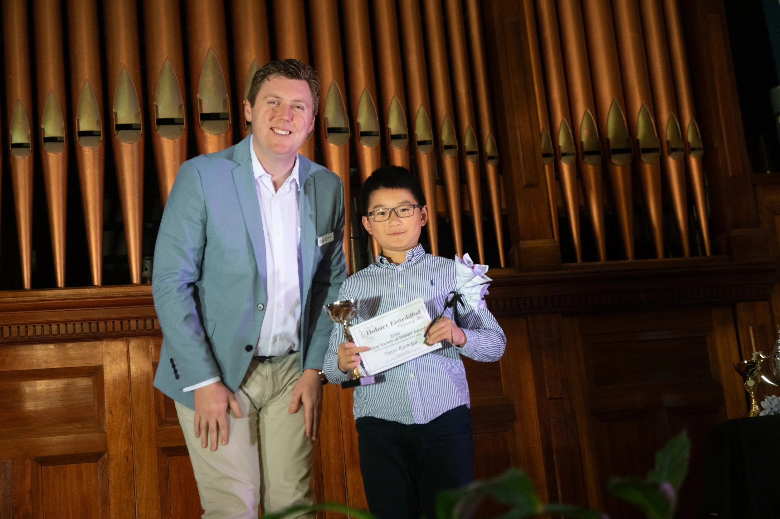 Guitar Society of Hobart Award winner, Yuxin Ryan Gu with President, Mark Holmes.
