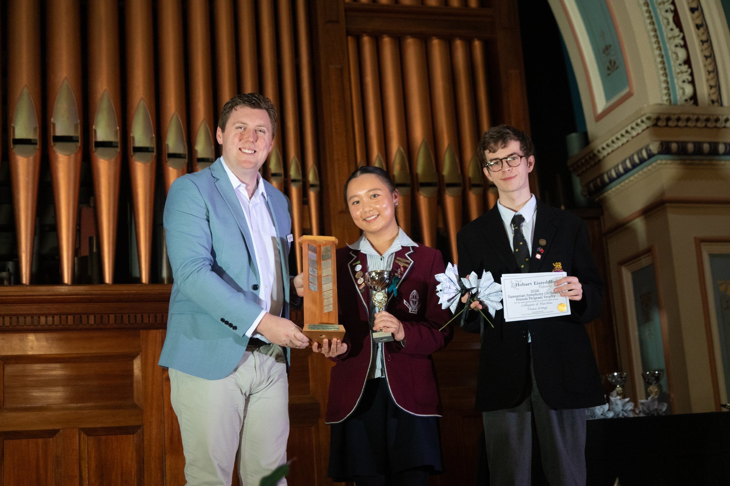TSO’s Friends Program Trophy winners,Collegiate &amp; Hutchins – Vivace Strings with President, Mark Holmes.