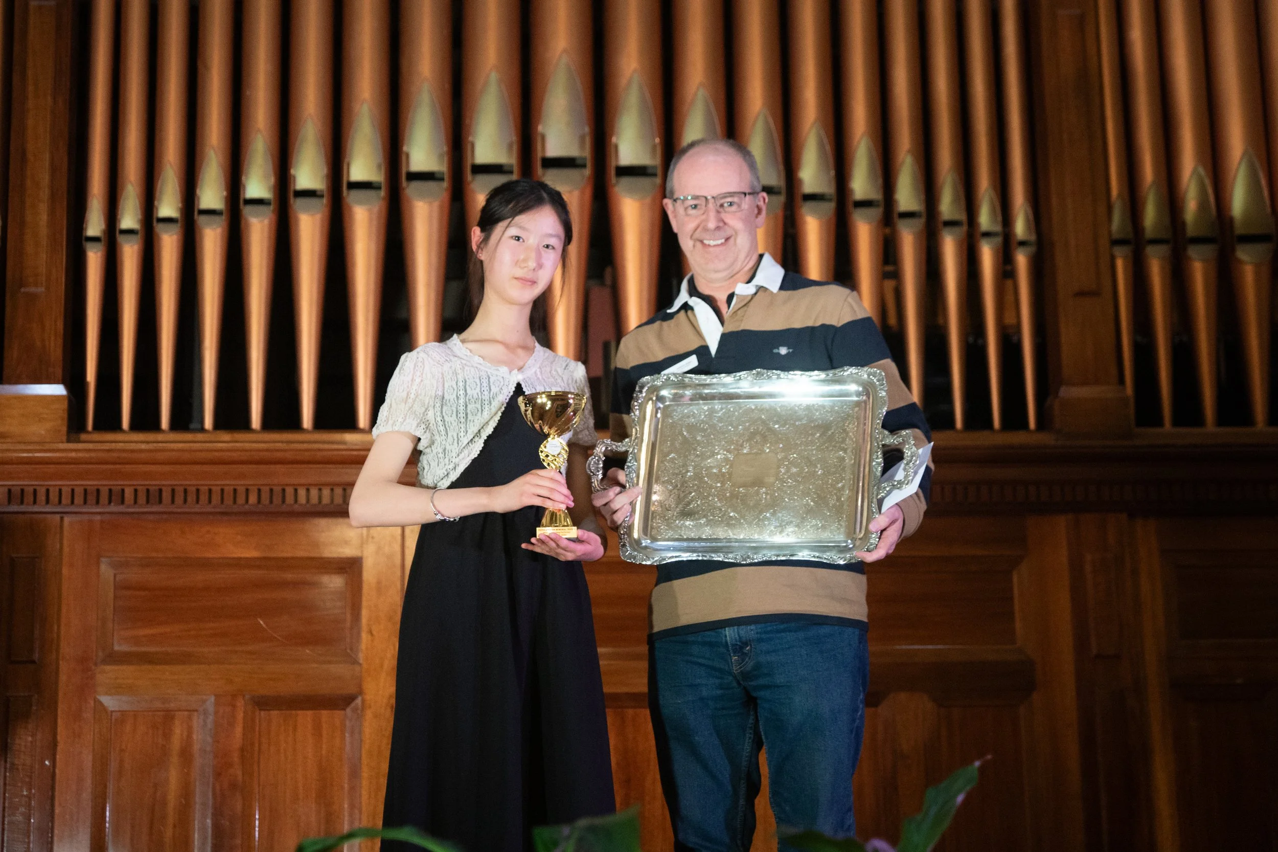 Eileen Johnson Memorial Trophy &amp; Award winner Yifan Wang with Senior Vice President, Andrew Johns.