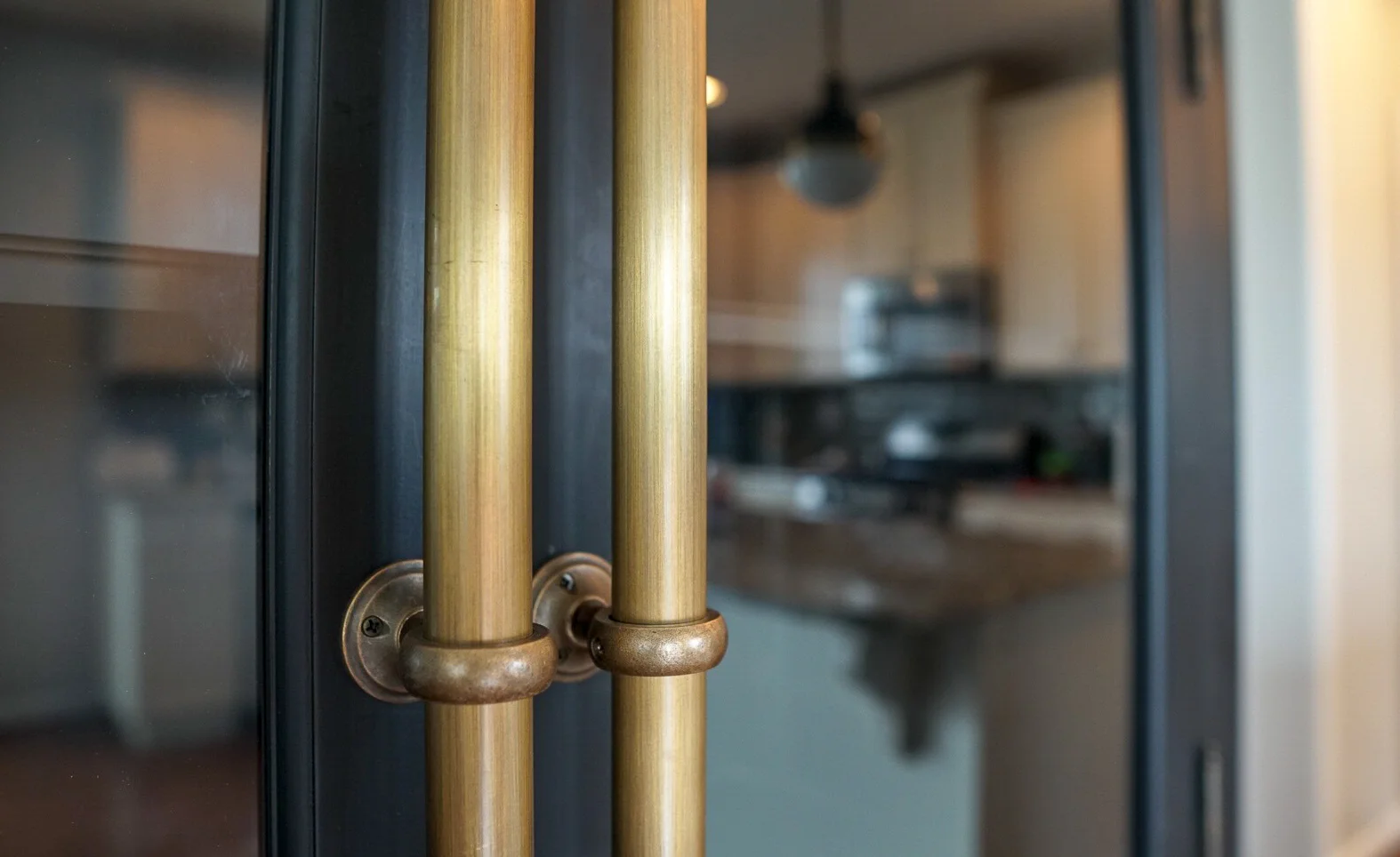 Black-Kitchen-Cabinet-Brass-Hardware.jpg