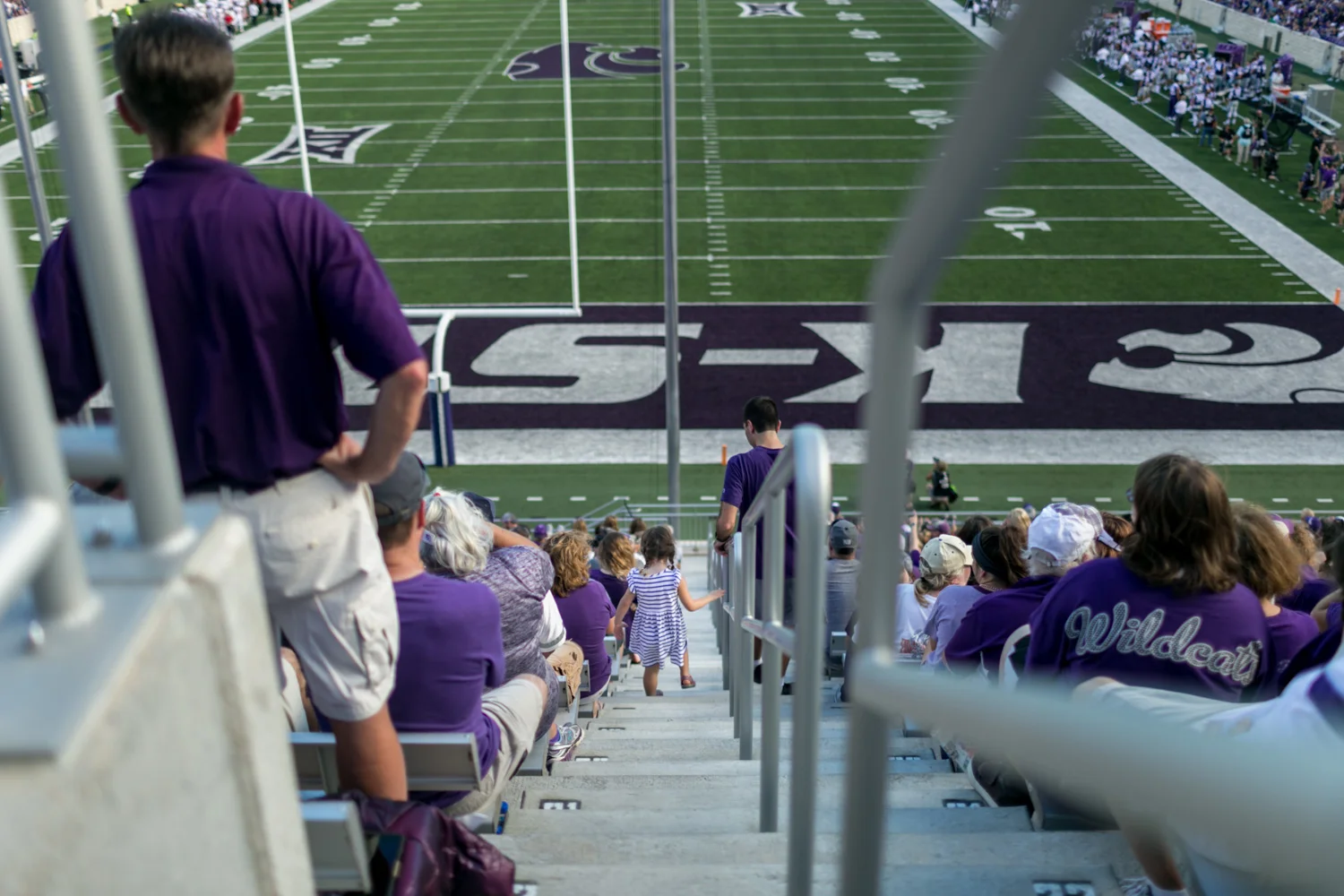 Captured by Best Documentary Family Photographer, Renee McDaniel of Renee McDaniel Photography in Manhattan Kansas. Photographed at Bill Snyder Family Stadium, Kansas State University, Manhattan Kansas.