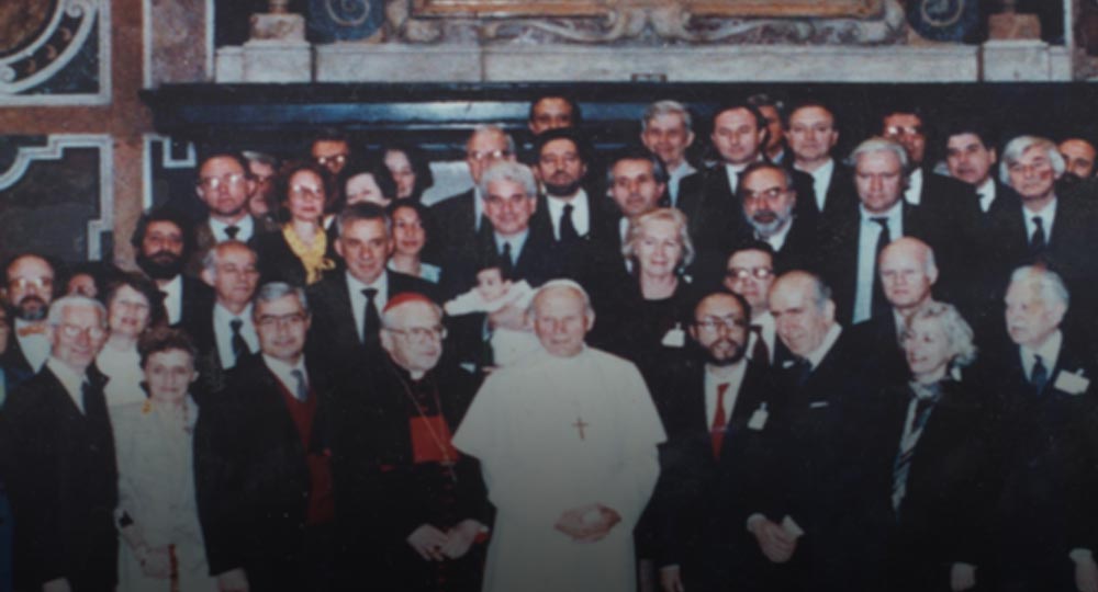  Paul Schwartzbaum holding his daughter Amparo (center), with Pope John Paul II. Paul was a member of the Vatican technical commission for the restoration of the frescoes by Michelangelo in the Sistine Chapel. 