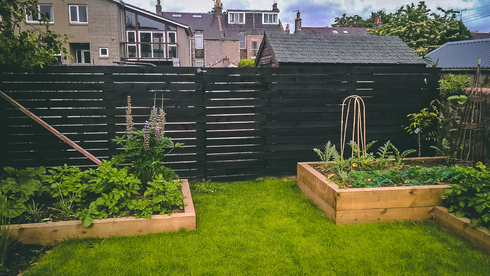 Fencing and sleepers raised borders