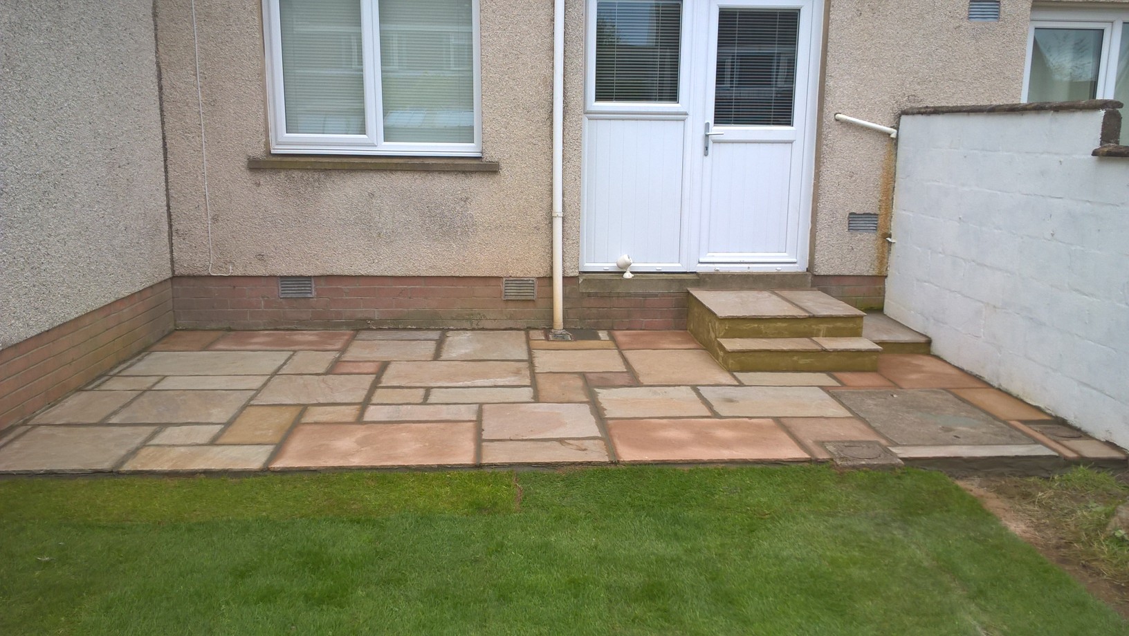 New patio, steps and lawn