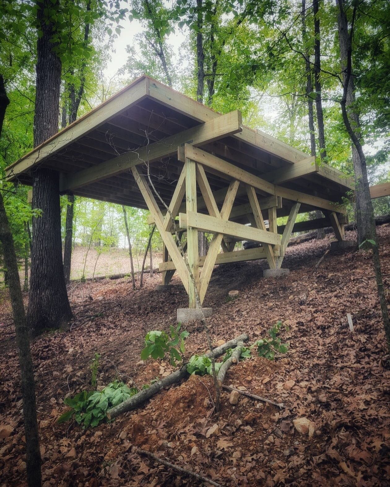 Platform for the Bridal Suite Treehouse at @glasshausweddings, the last of 8 treehouse platforms we built for this incredible new wedding venue on Table Rock Lake.  We had so much fun working with a fabulous and creative client, hoisting 700 lb beams