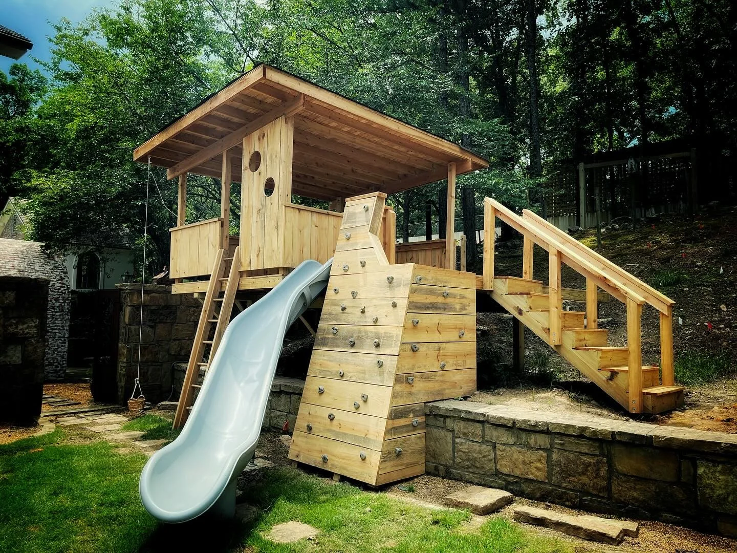 Backyard treehouse contoured to fit the slope.  Great work on the details and execution by @j._byrd and team