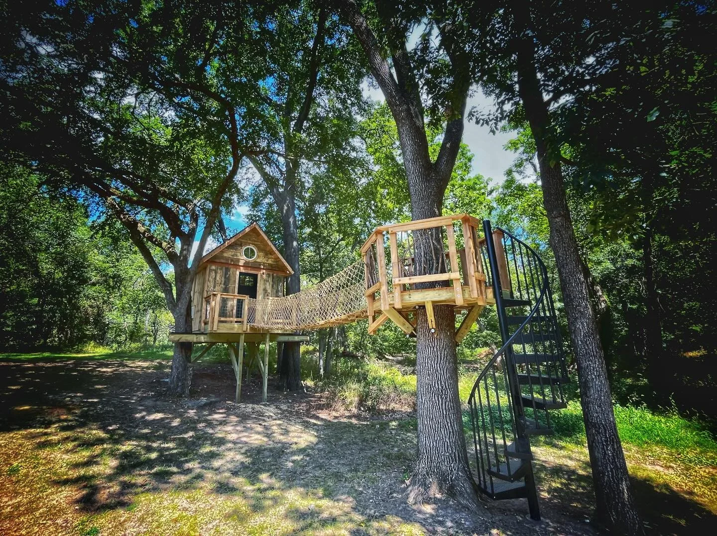 Cozy 160 sf treehouse by the most beautiful little Ozarks creek.  26&rsquo; swinging bridge, crows nest with spiral staircase.  Beautiful carpentry by @thor4424 and the rest of the crew.