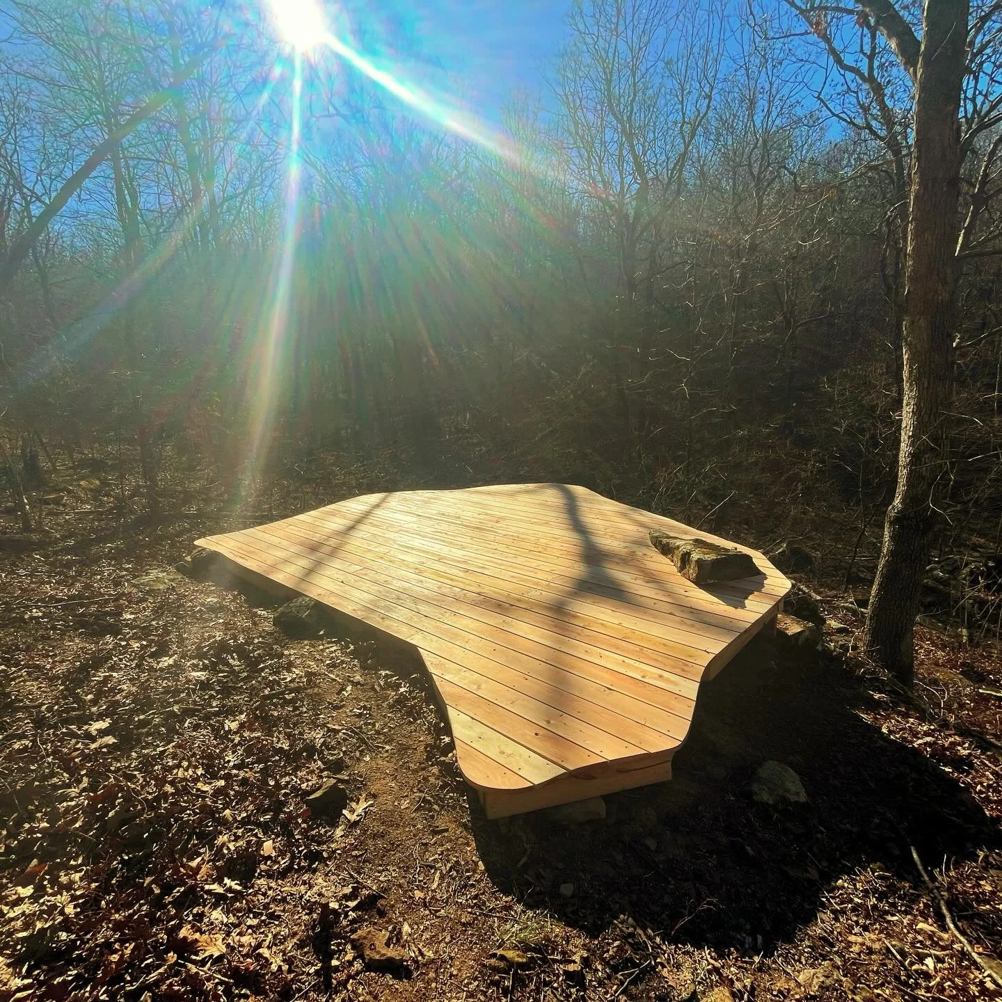 Free-form yoga platform built onto a mossy rock outcrop near Kingston, AR.  No mosses were harmed during construction :)