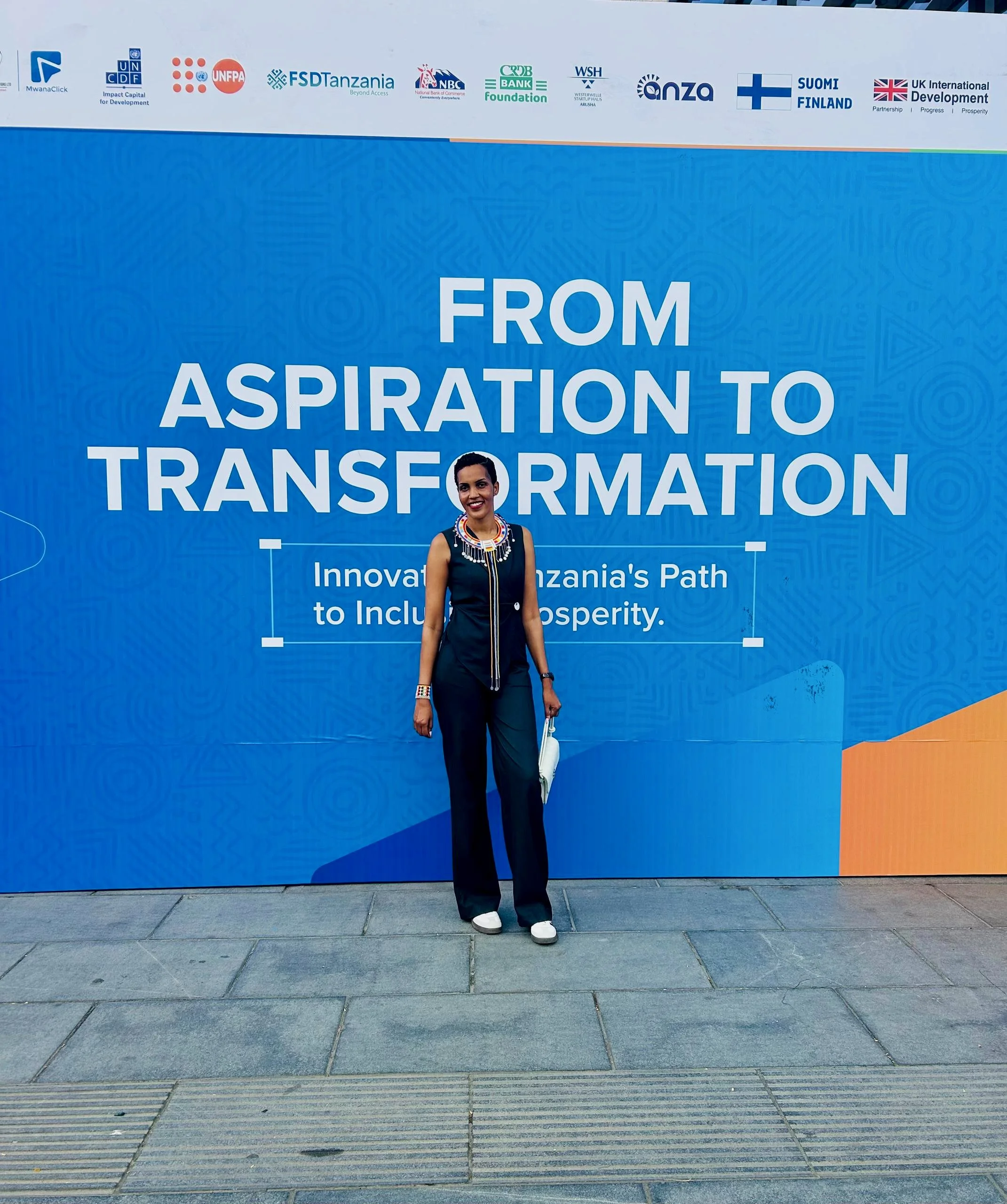 Agness representing HFC Tanzania at Innovation Week Tanzania 2026 in Dar es Salaam.