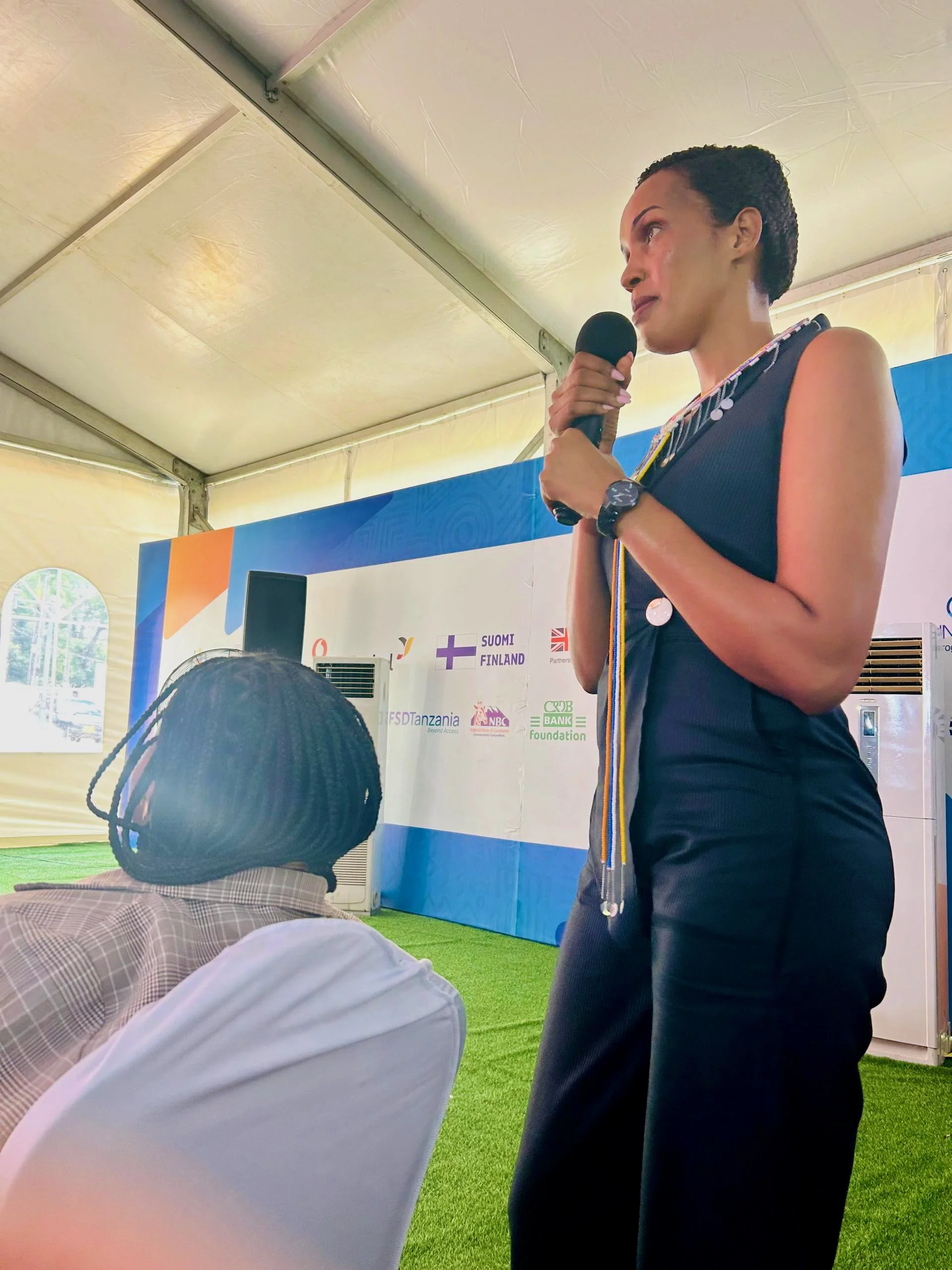 Agness sharing HFC's Clean Stove Initiative during the "Grassroots to Growth: Rural Innovation in Health & Livelihoods" session.