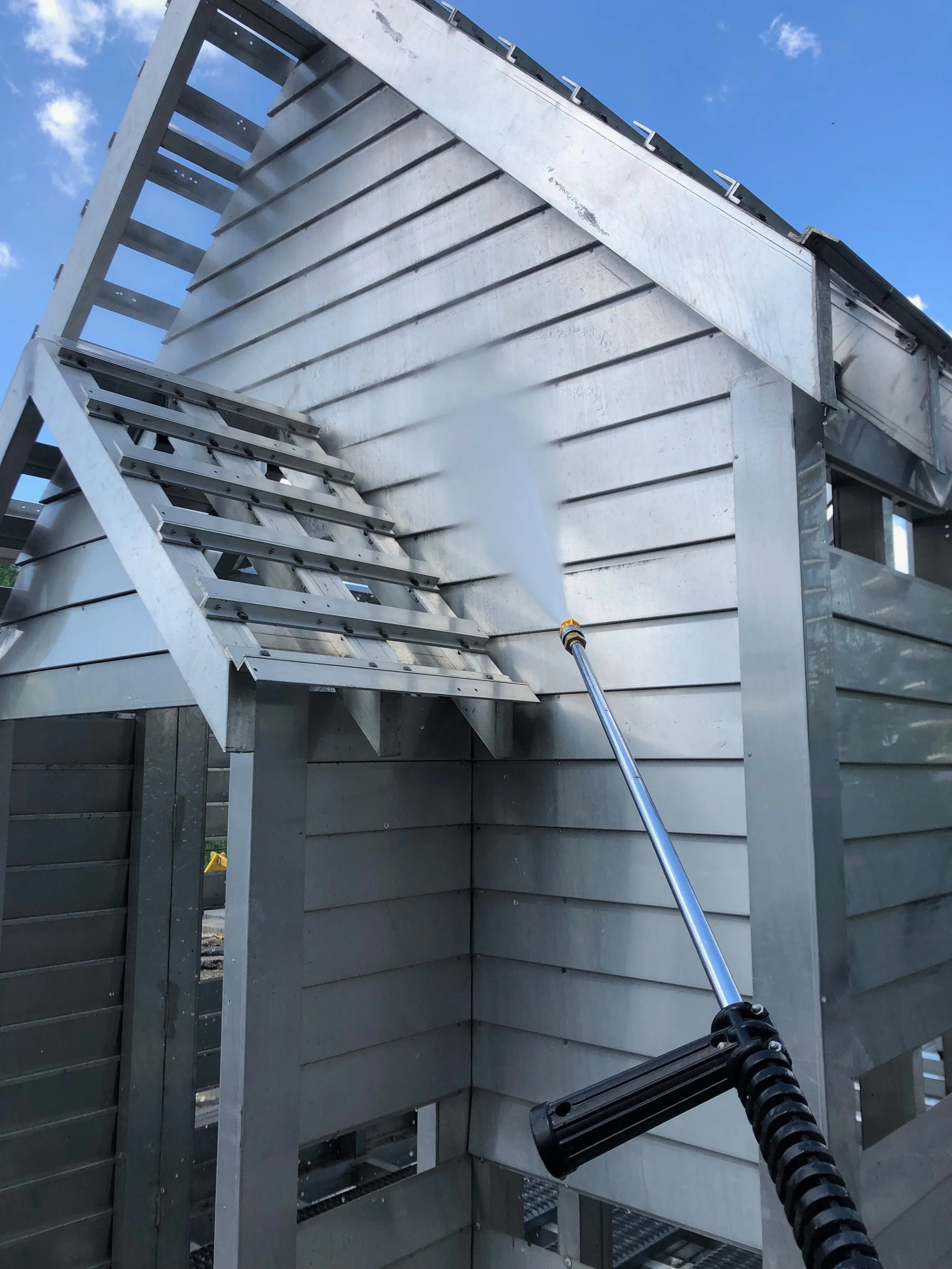 Commercial Power Washing Aluminum And Galvanized Art Sculpture In East Village