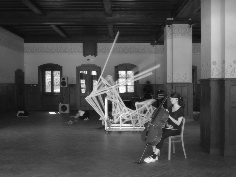 ...As they all stand there, one goes to the other side, opens a window and lets the razor cold wind to enter the room. The table still awaits the poet to write his book, the conductor looks for his instruments as she is blindfolded and hears nothing...