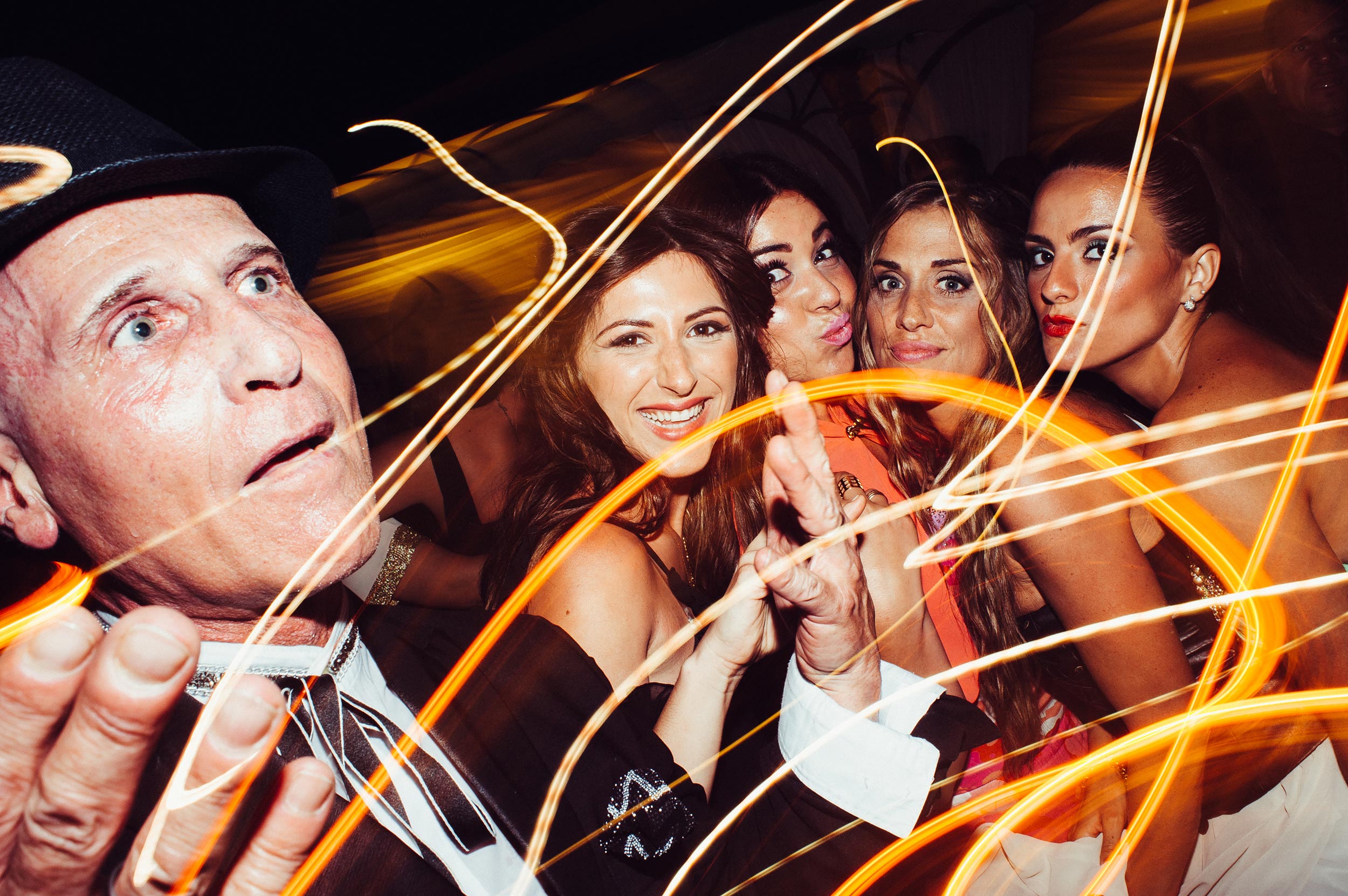 beautiful-girls-and-astonished-eccentric-man-reception-party-wedding-in-naples.jpg