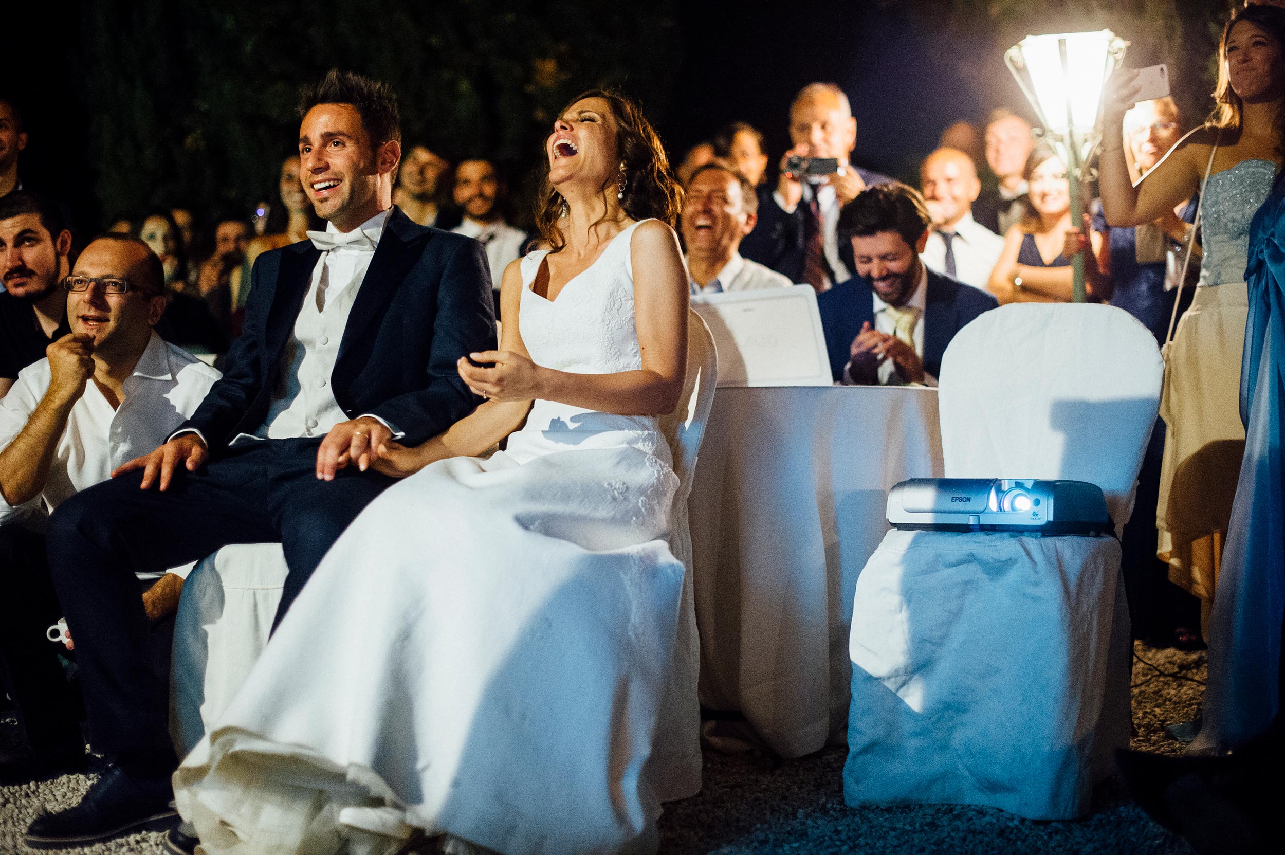 the-bride-and-groom-laughing-at-their-surprise-video.jpg