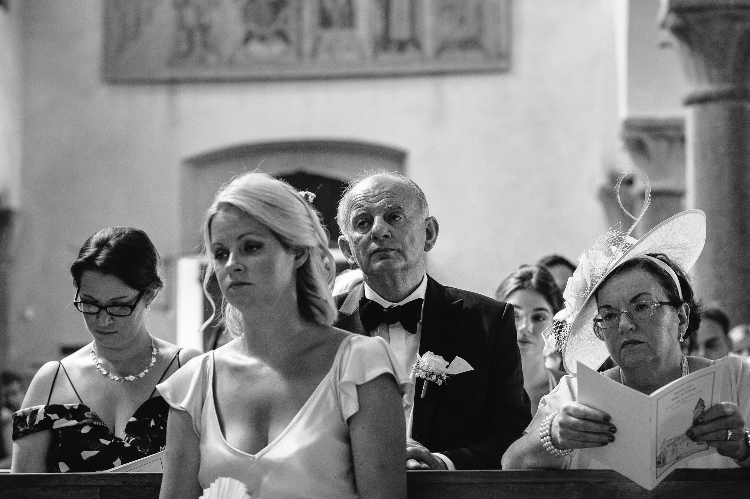bored-guests-ceremony-black-and-white-wedding-photography.jpg