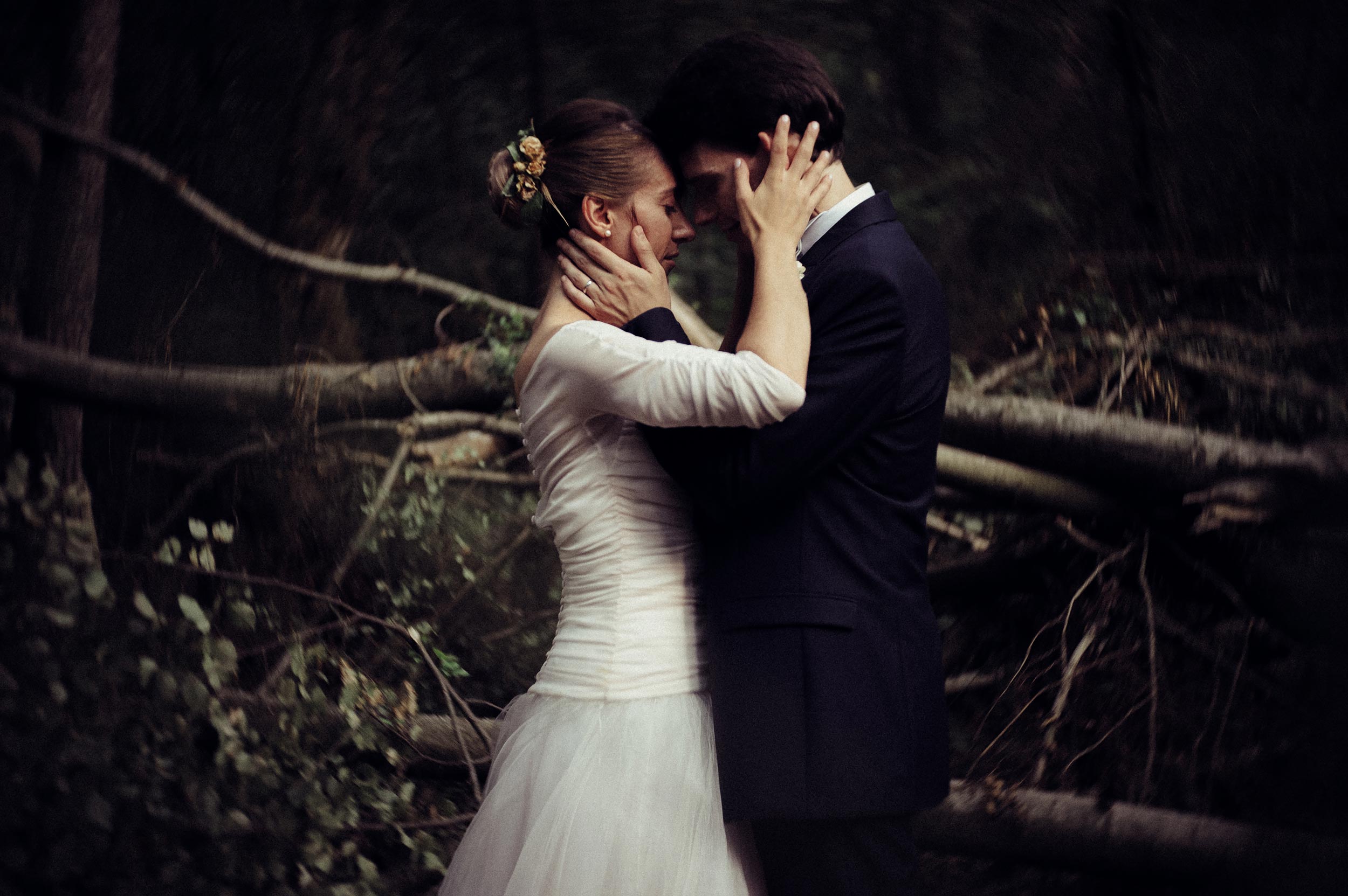 romantic-orange-teal-bride-and-groom-portrait-in-the-woods-looks-like-film.jpg