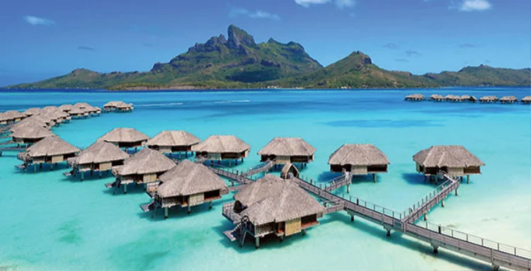 Some of the over-water bungalows found in the French Polynesian Islands of the Tahitian Islands are some of the most romantic in the world! Picture from the Four Seasons Resort in Bora Bora.