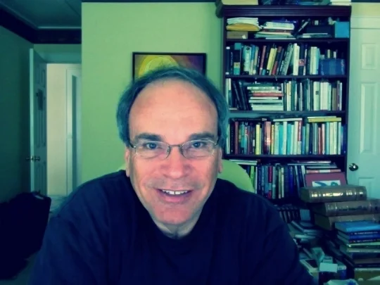 Tom-at-Desk-Smile.jpg