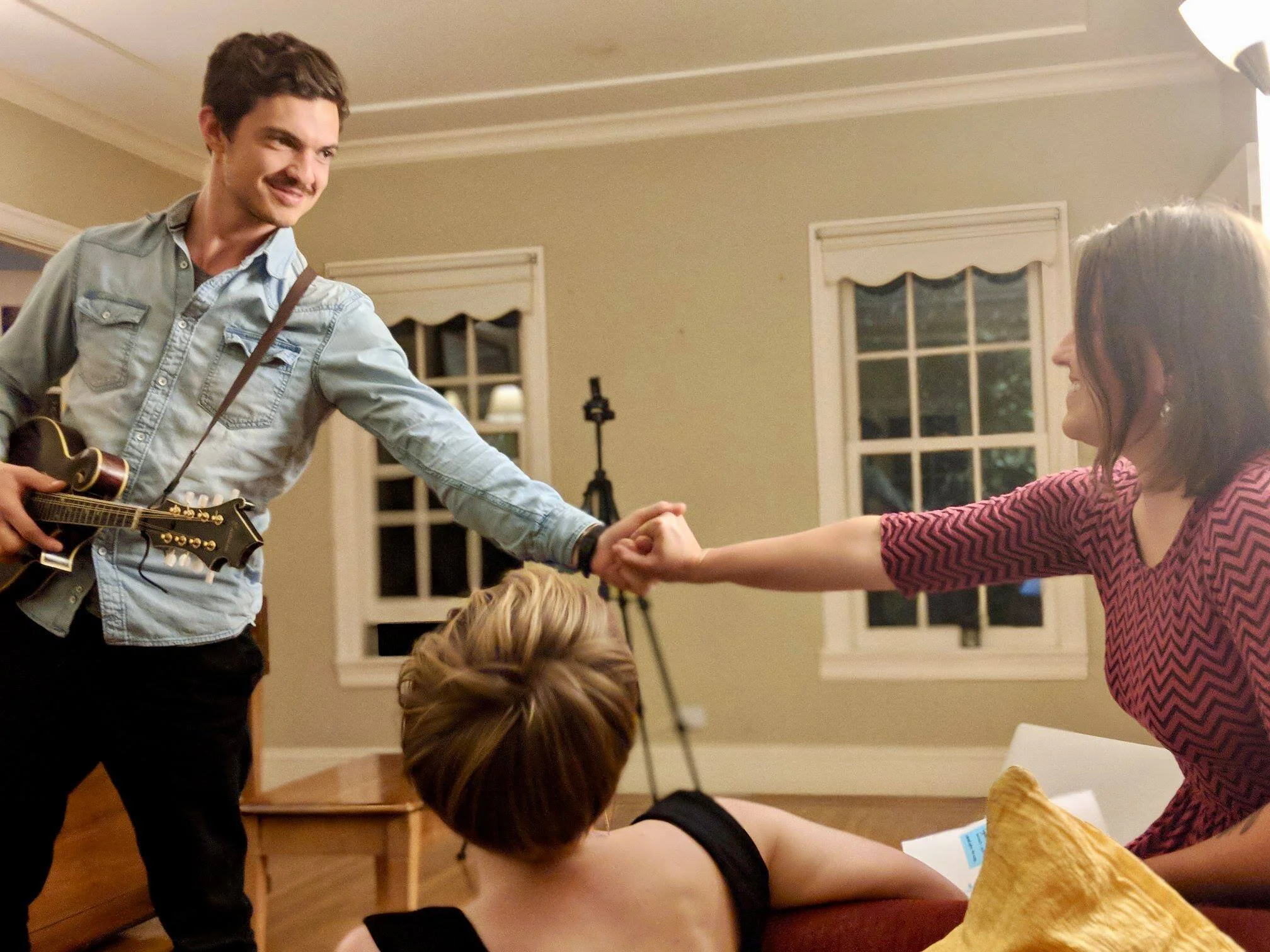 Performing live original music at a house concert last winter. I would not have gotten my shit together to perform this past year without the support of dear friends, as well as coaching principles that help me stay the course when I might otherwise talk myself out of things!