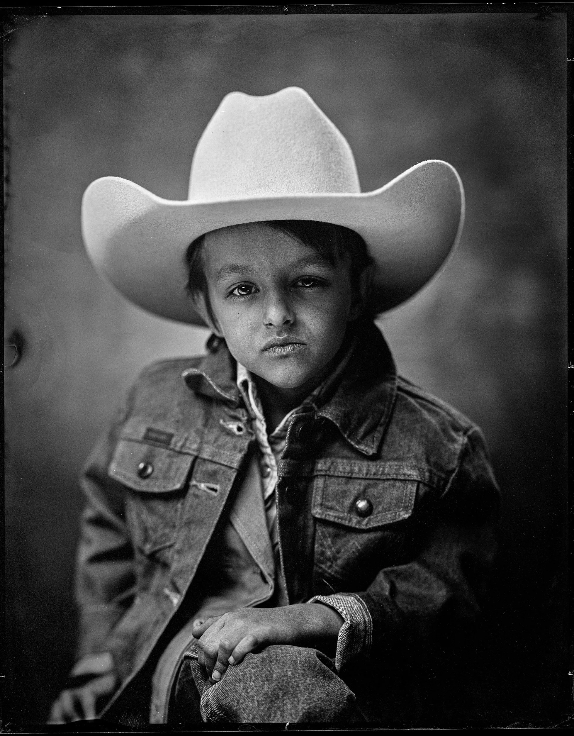 18-families-child-almost-lost-beneath-an-oversized-white-cowboy-hat-n155.jpg
