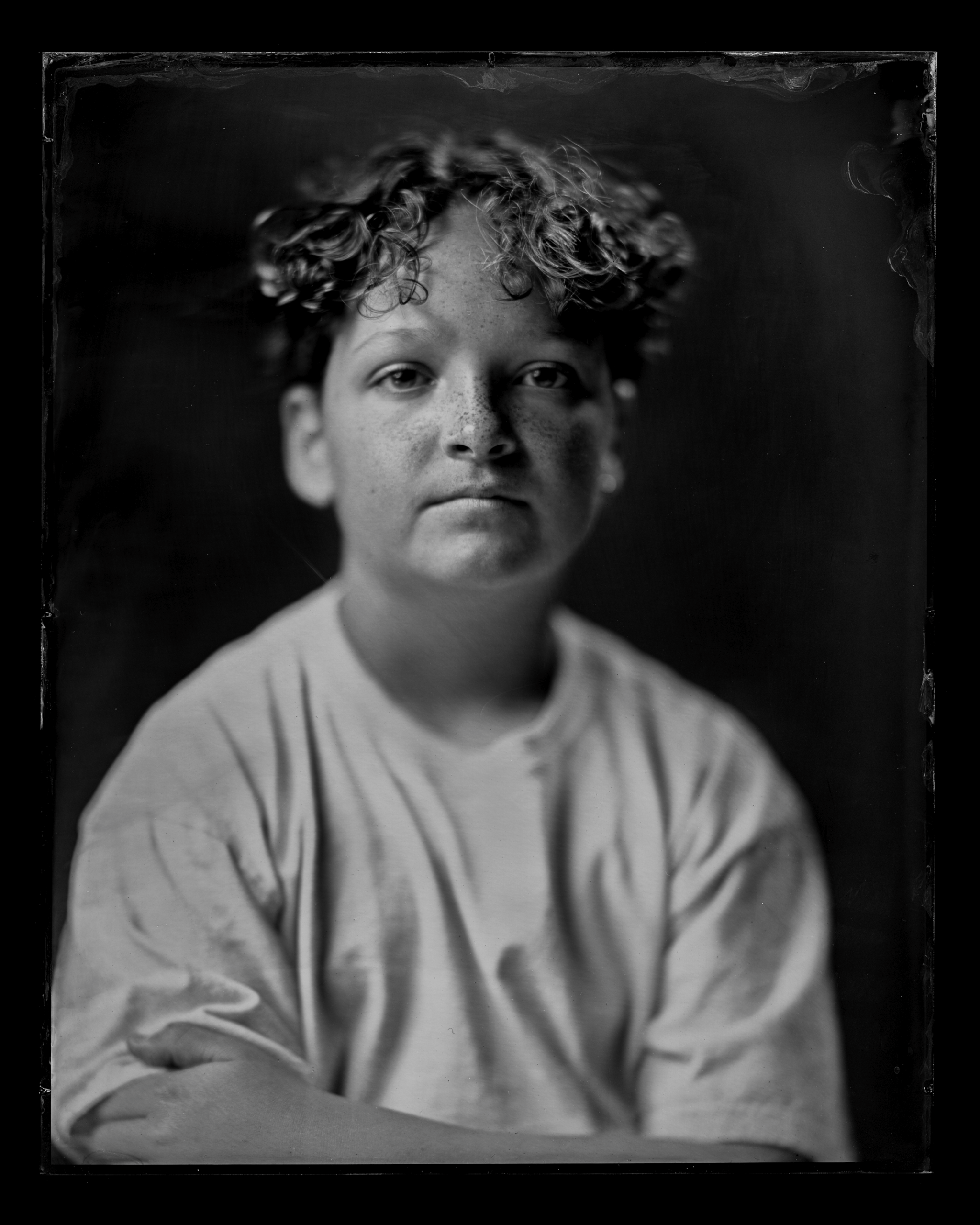 26-families-tintype-portrait-a-young-person-with-short-curly-hair-a183.jpg