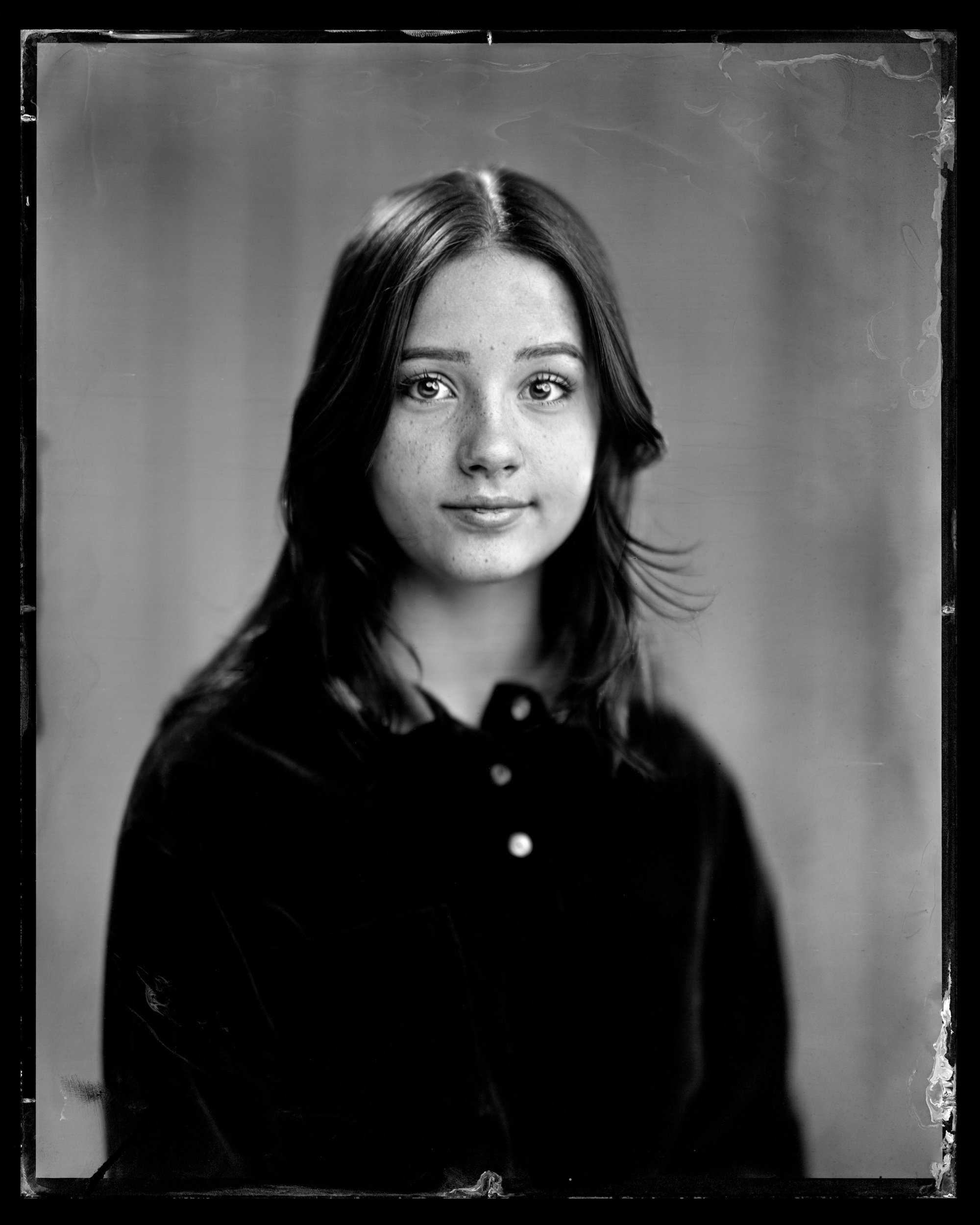 40-families-young-girl-with-long-dark-hair-a-quiet-studio-tintype-portrait-a77.jpg