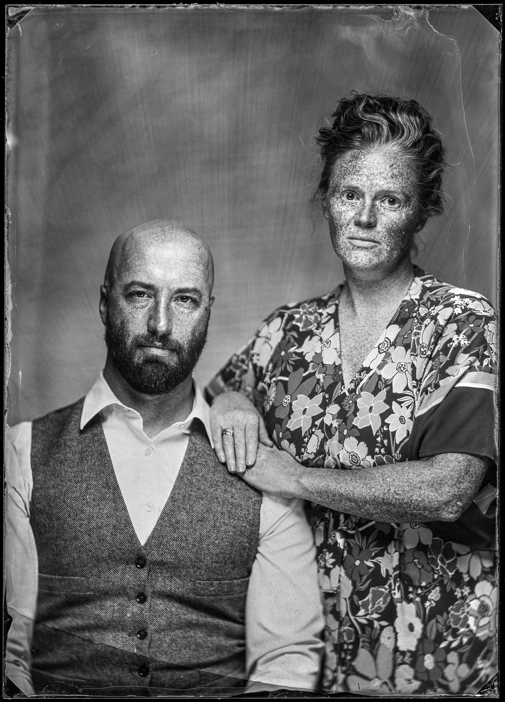Older couple, the man in a waistcoat, the woman in a floral blouse — 8x10 tintype