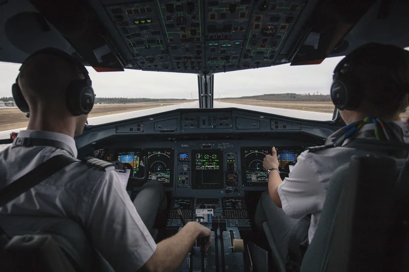 picture of pilots driving airplane.jpeg