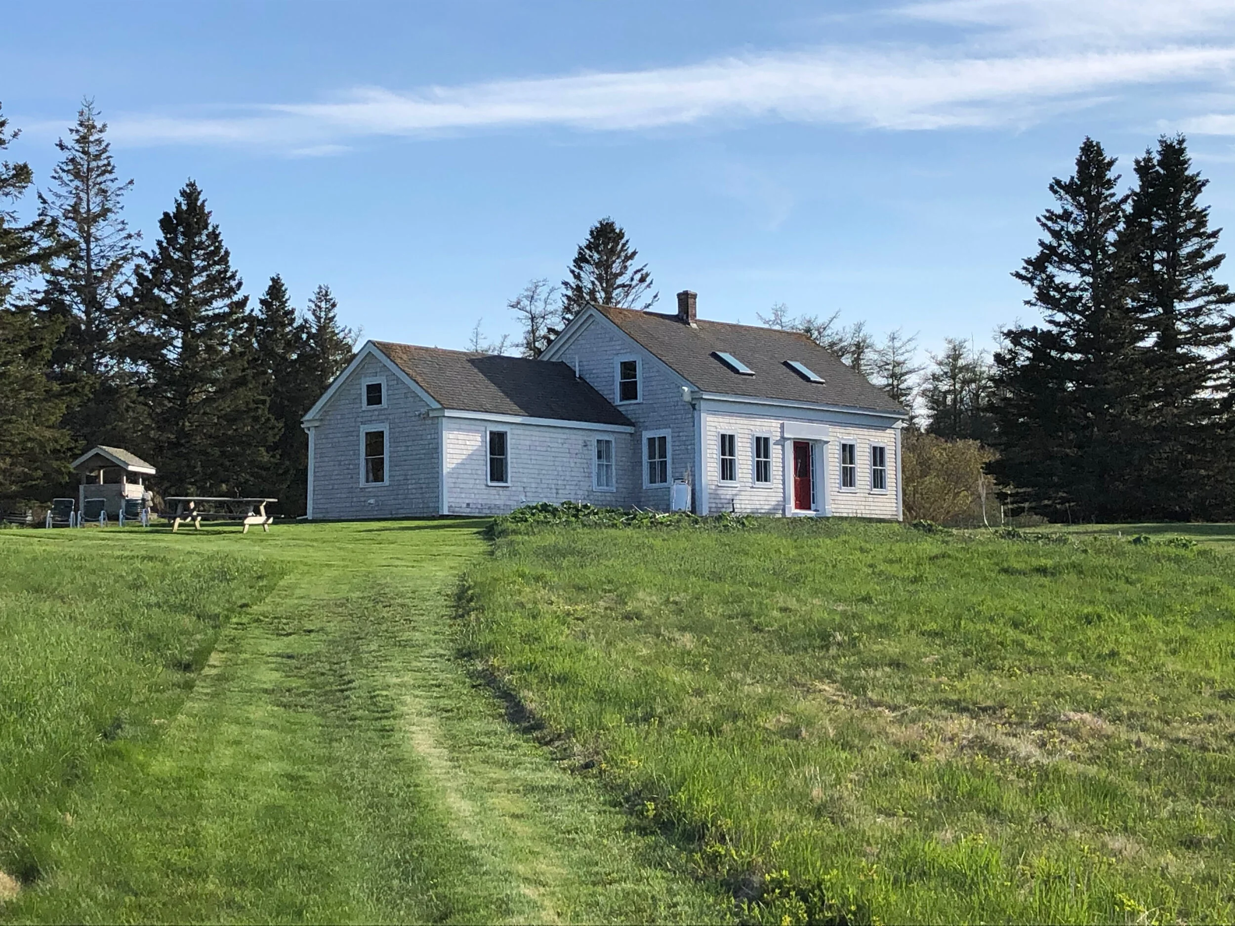 The north facade, facing toward the water. This is the original entrance, as many folks arrived by water in the early days.