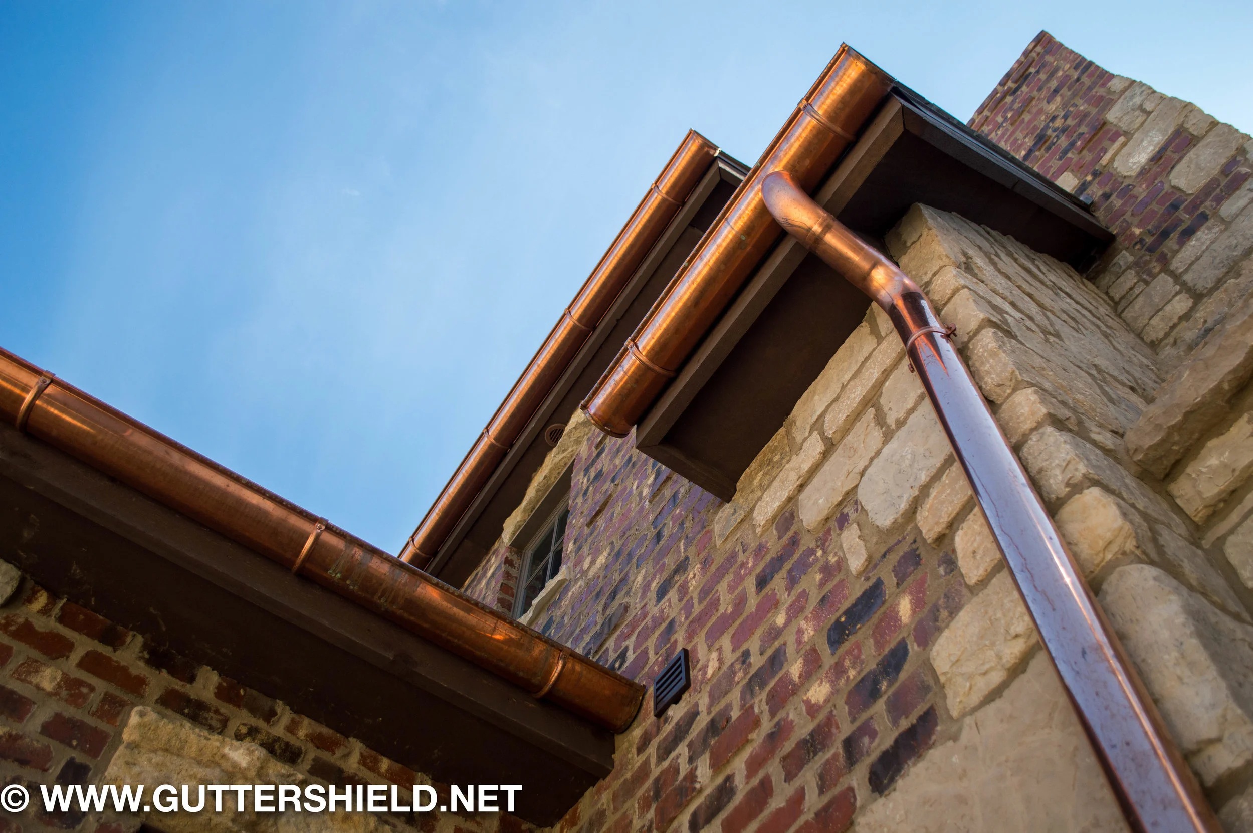 copper-half-round-gutters-lake-house-lifestyle.jpg