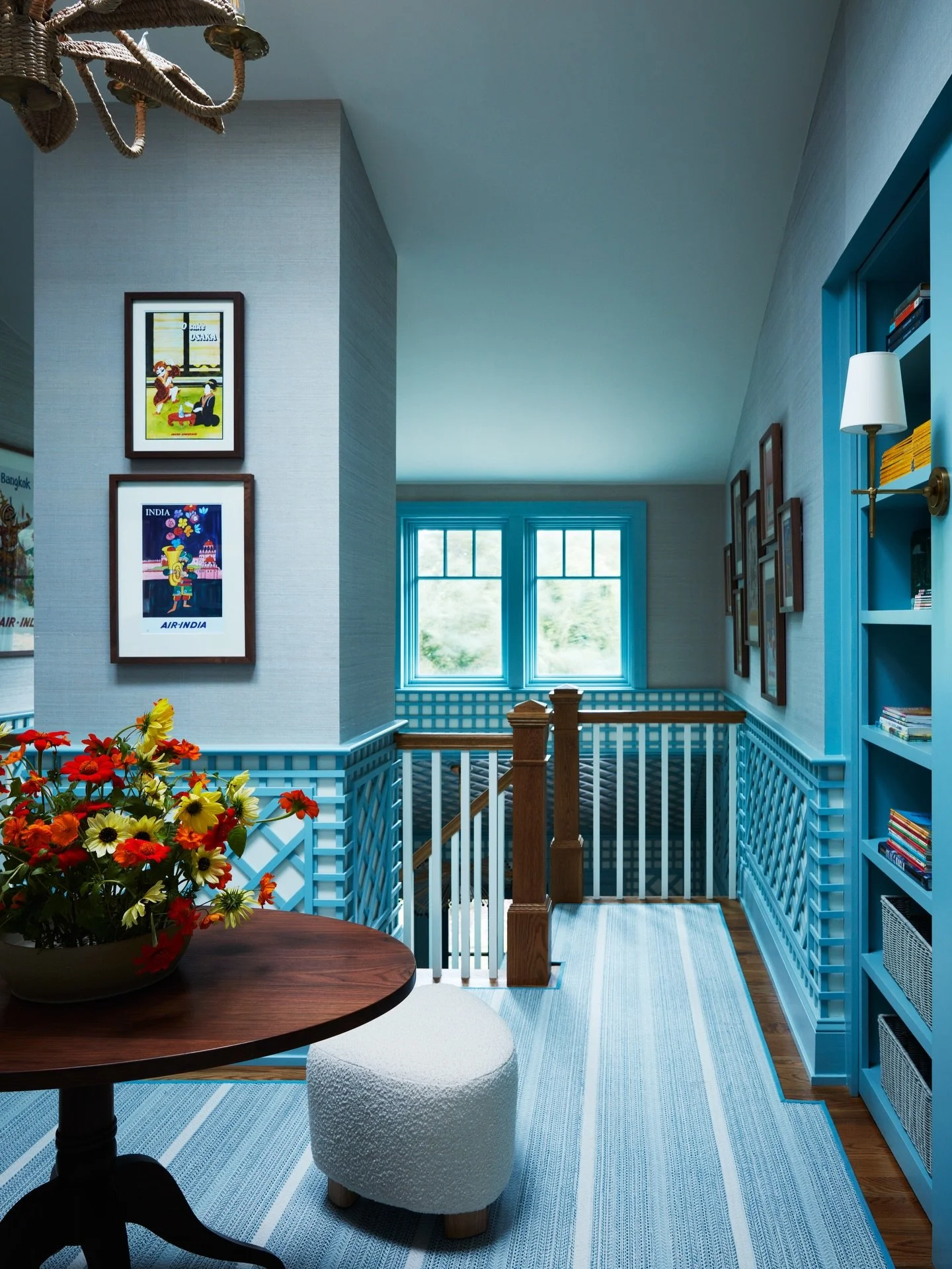 The wood in this room - on the floor, the library table, the frames on the art, and the newel posts - warms up and and grounds the space amid the lattice and paint. 
⁠
⁠
⁠
⁠
⁠
⁠
📷 @timlenzphoto⁠
⁠
⁠
⁠
⁠
⁠
#gideonmendelson #whatdesigncando #mendelson