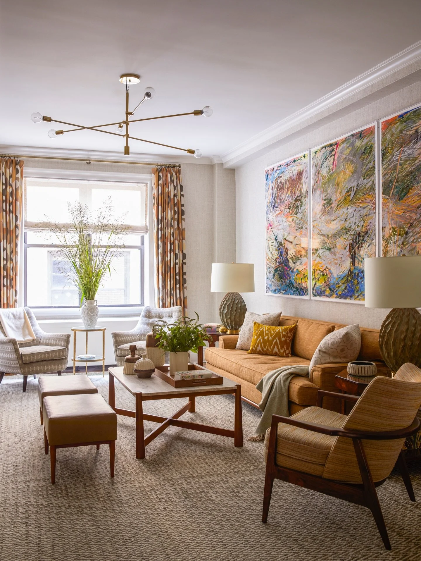 We&rsquo;re always trying to create balance in spaces that we design. This living room is a careful mix of fully upholstered pieces, chairs with wood frames, and a mix of materials - wools, leathers, stone, glass, and metal. It&rsquo;s a balancing ac