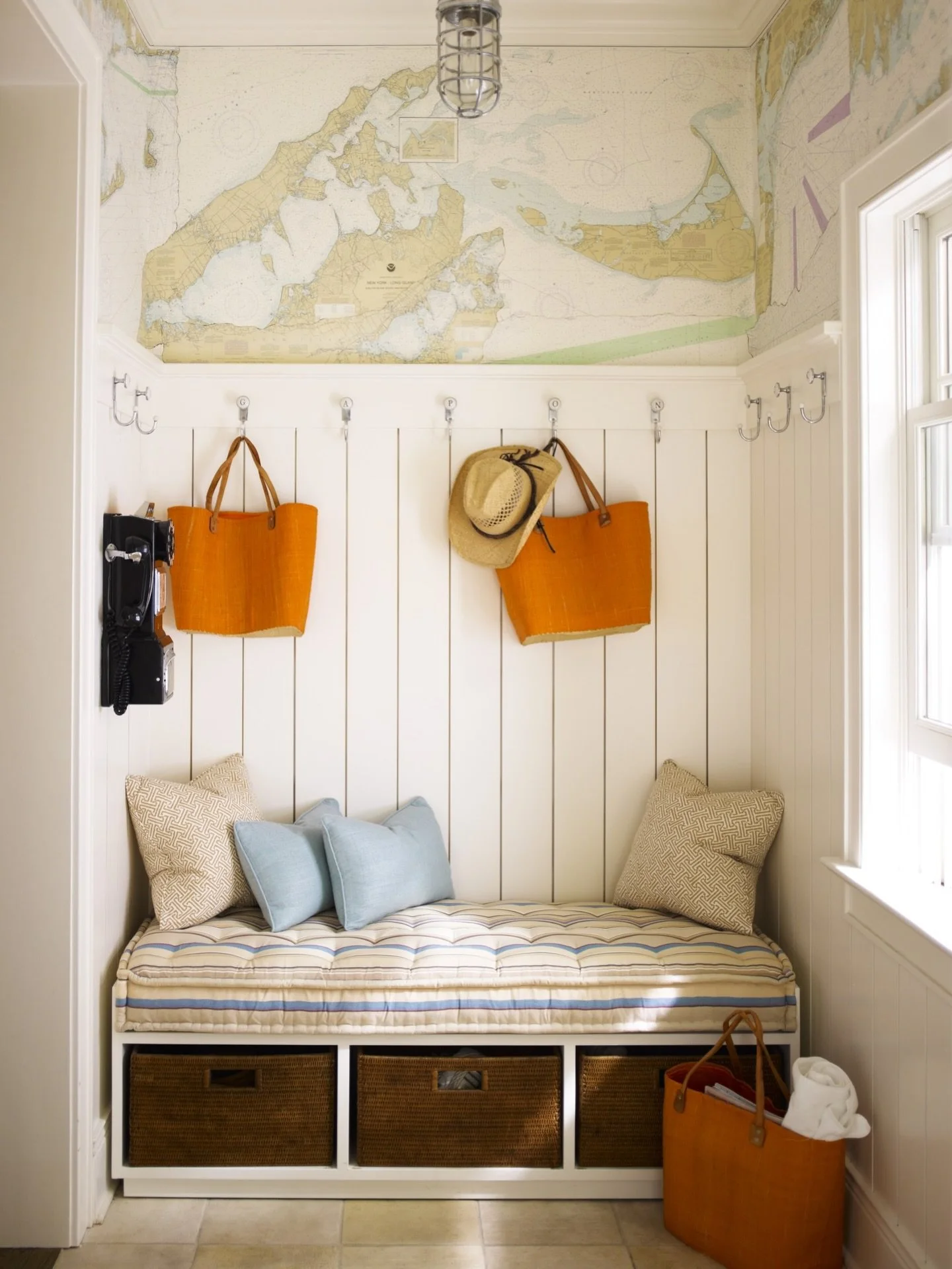 This mud room is a small space in our Sagaponack home but we designed it to be very functional. There&rsquo;s a place for shoes, a place to put on shoes, hooks for bags and coats, and baskets for hats and extra gloves.
⁠
⁠
⁠
⁠
⁠
📷 @ericpiasecki⁠
⁠
⁠