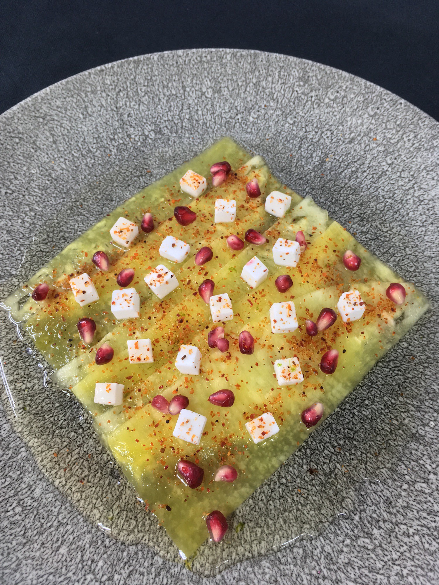 Pineapple Carpaccio, Yuzu Syrup, Pomegranate, Just like Feta, Tajin Spices by Franck Garanger — Apollo Group