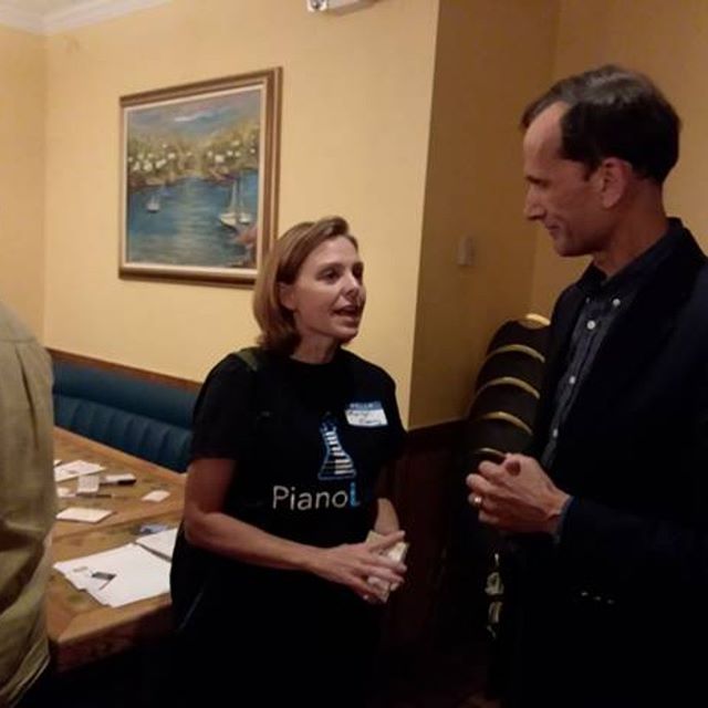 Marilyn O'Leary of Piano Lab with Mount Vernon Supervisor Dan Storck