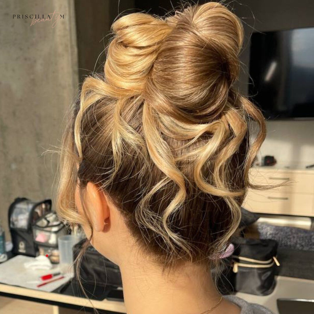 If wedding day jitters have got you on edge, consider a chic high bun updo. ⁠
⁠
Not only is it a stunning choice, but it also keeps those nerves from making you touch your hair. 🤍⁠
⁠
Who else is loving this high messy bun? Drop us a ❤️ if you are! ⁠