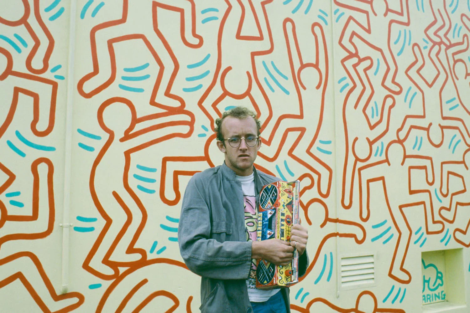  Keith Haring in front of his Collingwood mural, 1984 / Photograph by Polly Borland (via ACCA )