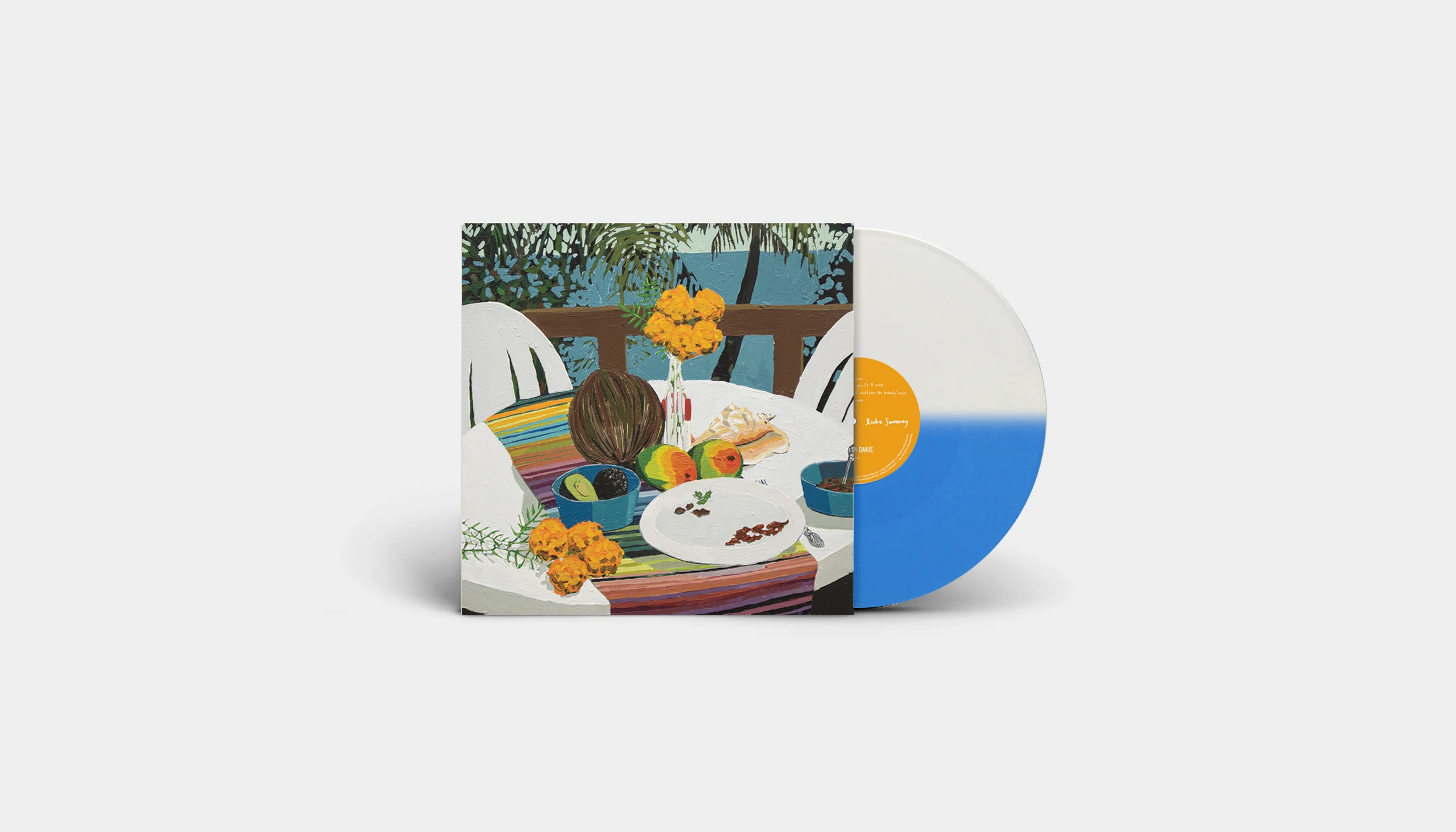 DE019LP-peacemeal-album-mockup-wide-BlueWhiteSplit-Vinyl.jpg
