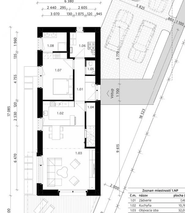 Architectural floor plan of a house showing rooms, furniture, and measurements in centimeters.