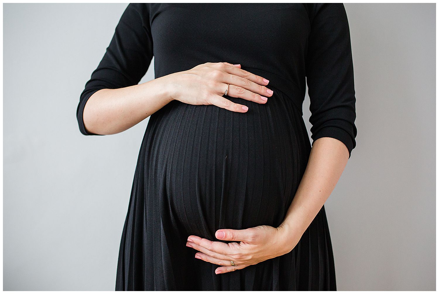 pregnant lady holding her belly