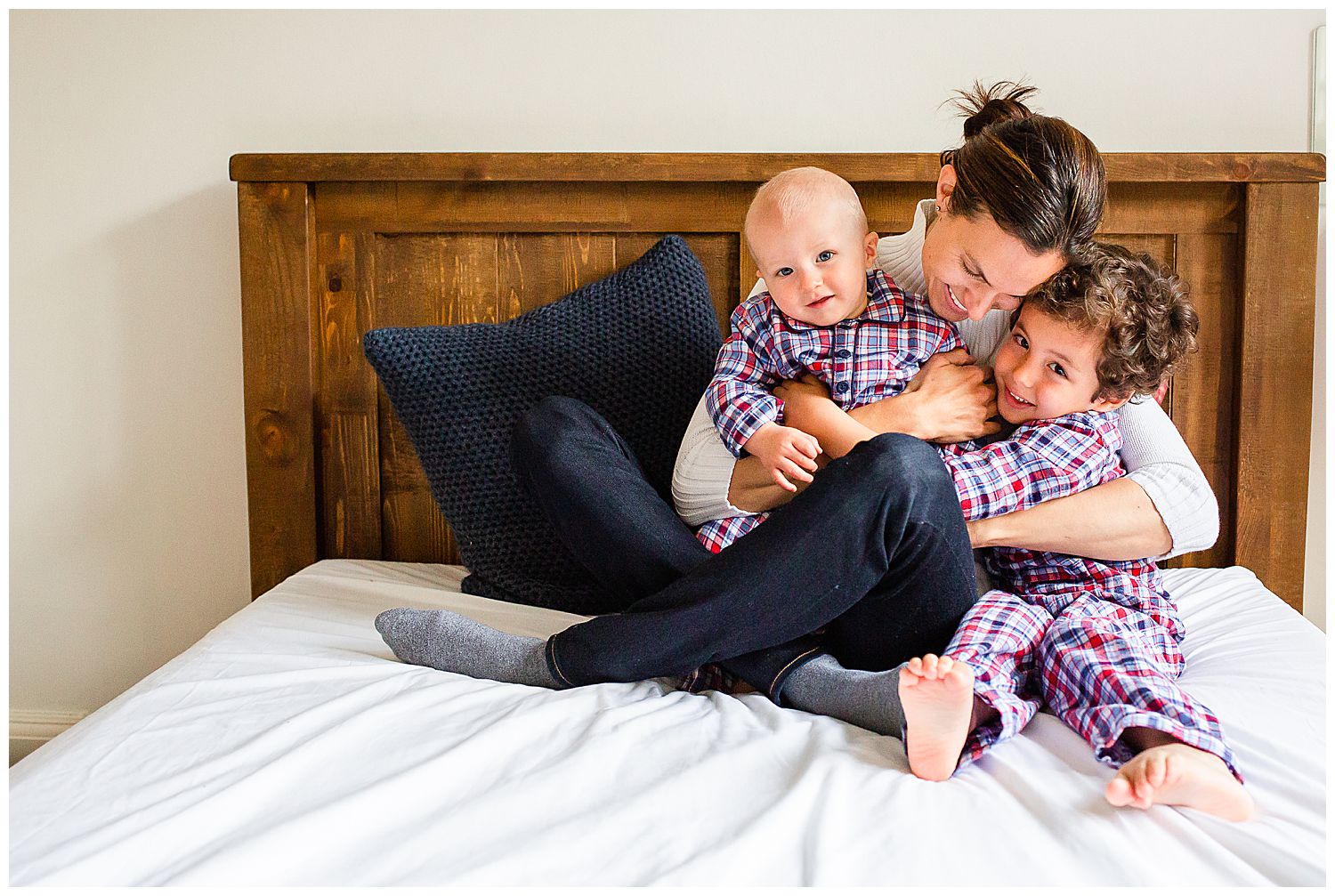 mum hugging two sons