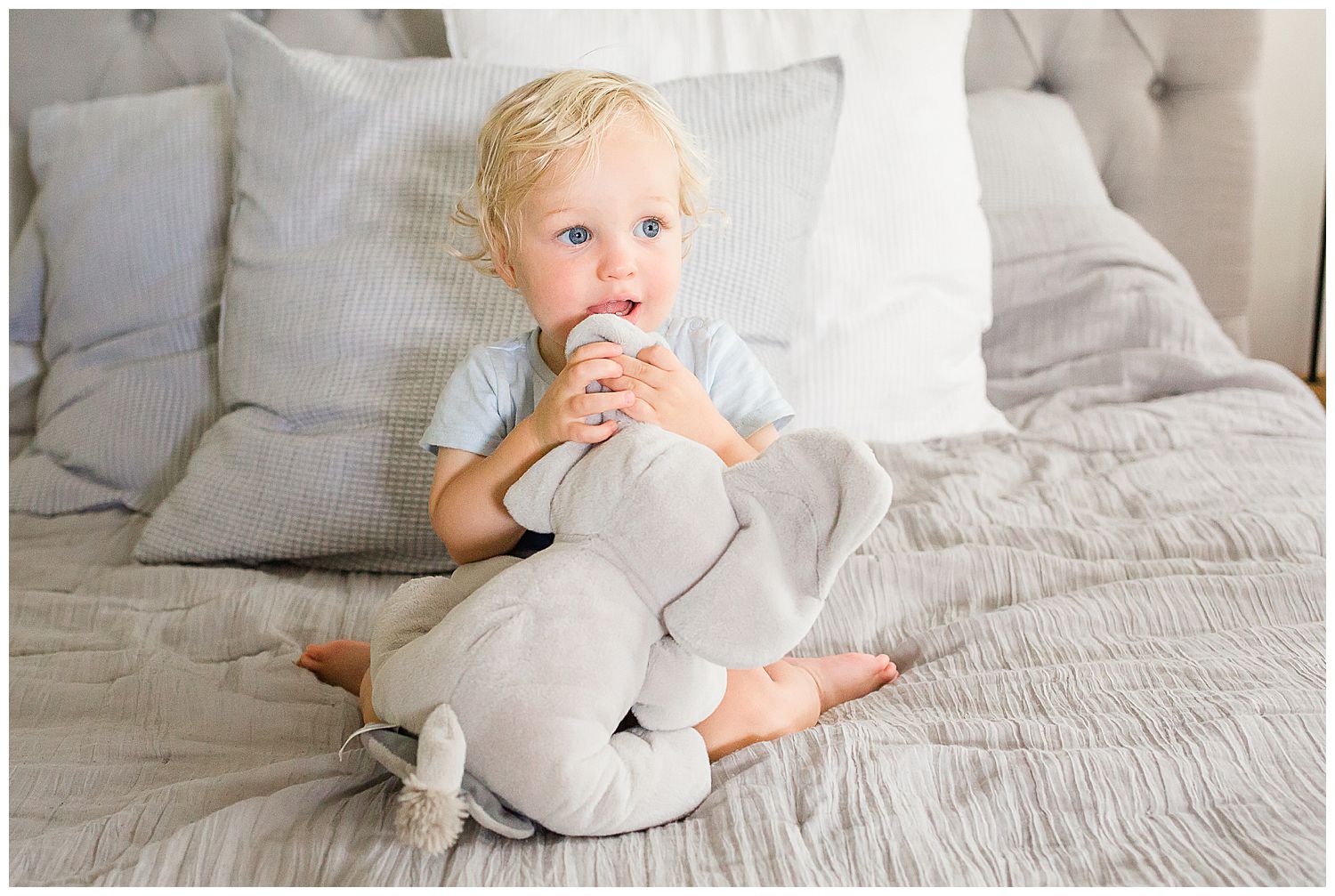 baby with soft elephant