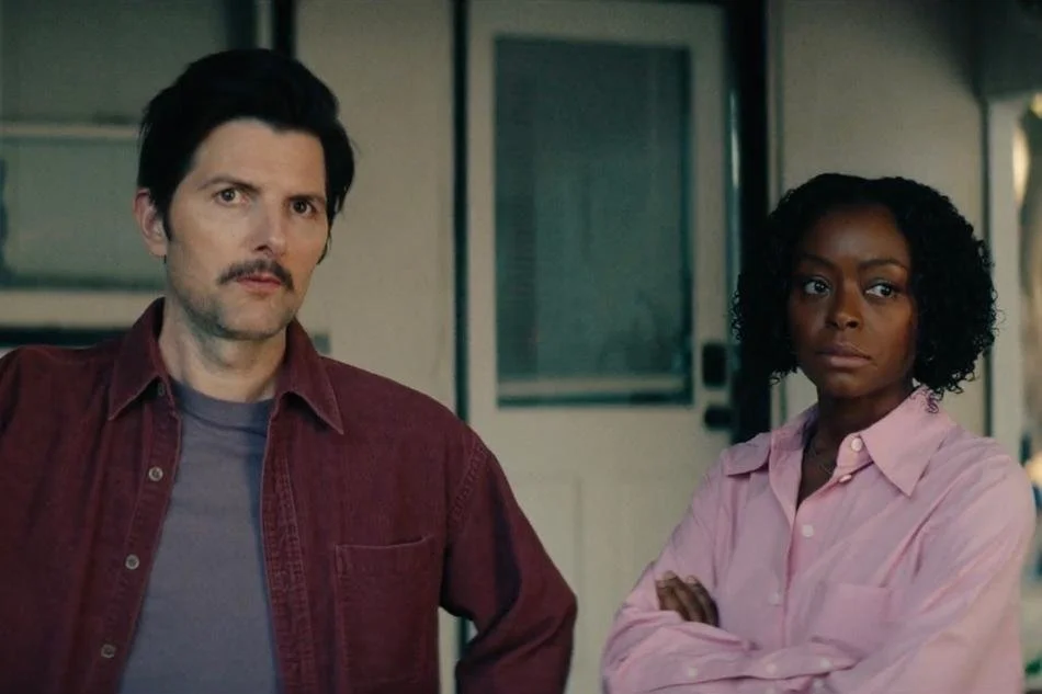 SXSW 2026 | Movie Review: Adam Scott &amp; Danielle Deadwyler Have Awkward Suspicions About Their Muslim Guests in Uneven Social Thriller "The Saviors"
